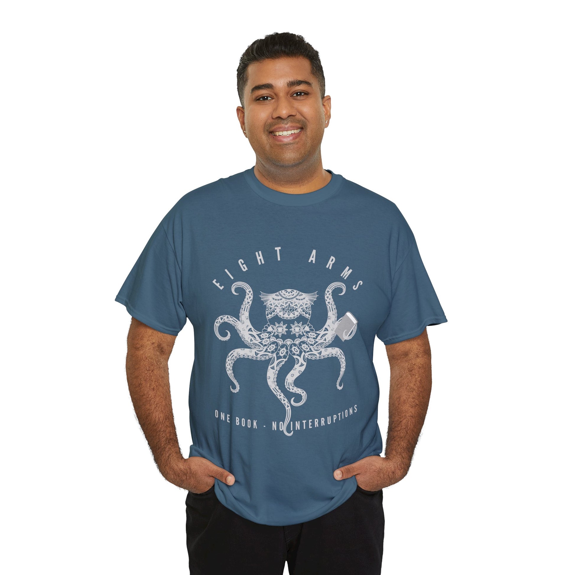 Man wearing a teal t-shirt with an octopus design holding a book and text 'Eight Arms, One Book, No Interruptions'