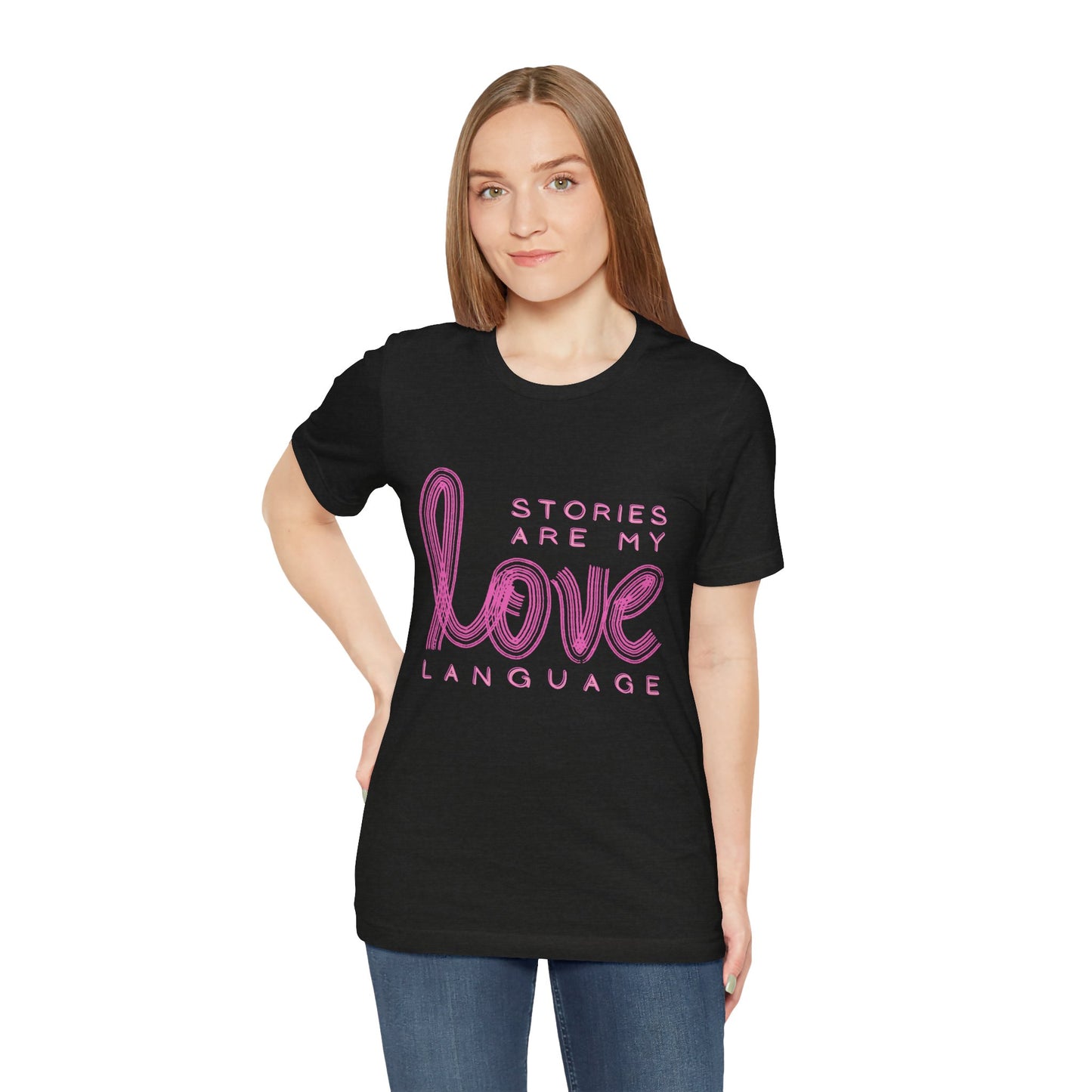 Woman wearing a black t-shirt with pink text 'Stories Are My Love Language'