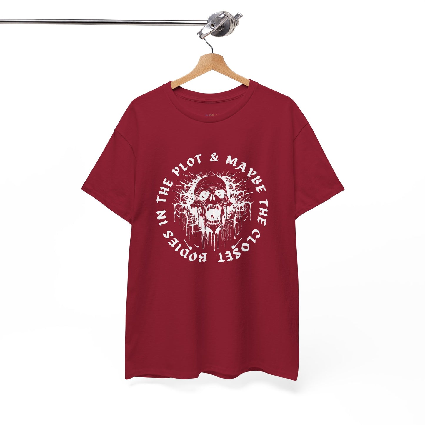 Red t-shirt with graphic of a screaming skull and text 'Bodies In The Plot & Maybe The Closet' on a hanger against a white background