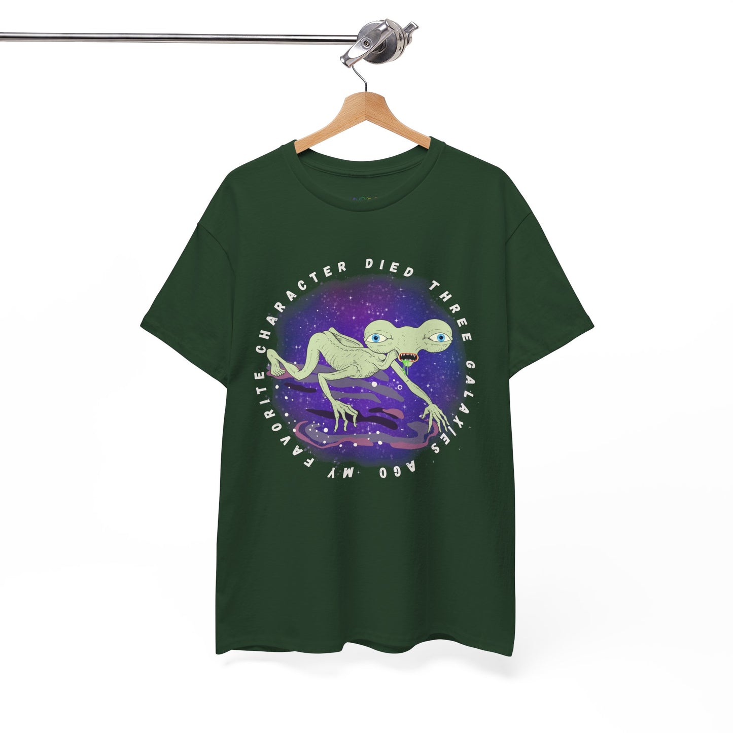 Dark green t-shirt with sickly alien crawling on it's knees and text 'My Favorite Character Died Three Galaxies Ago' 