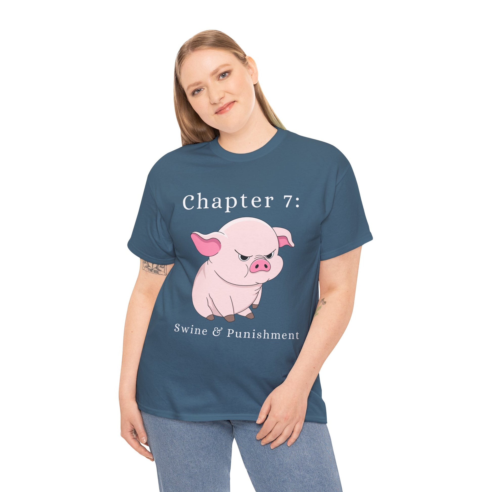 Woman wearing a blue t-shirt with an angry cartoon pig and text 'Chapter 7: Swine & Punishment'