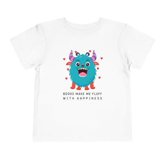White toddler t-shirt with a fluffy blue monster graphic, floating hearts and text 'Books Make Me Fluff With Happiness' on a white background