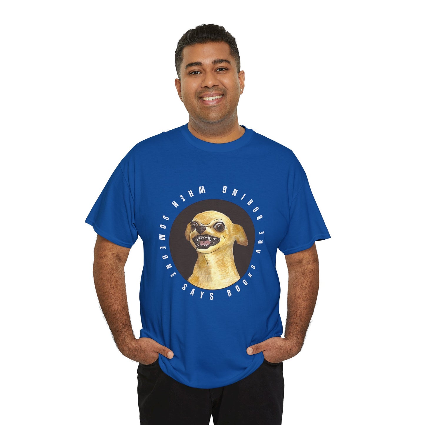 Man wearing a blue t-shirt with a graphic of a fierce chihuahua dog, circled by text 'When Someone Says Books Are Boring'