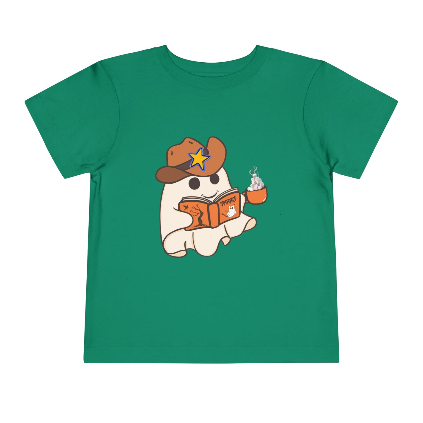 Green toddler t-shirt with a cartoon ghost, wearing a cowboy hat, reading a spooky book and holding a cup of hot cocoa