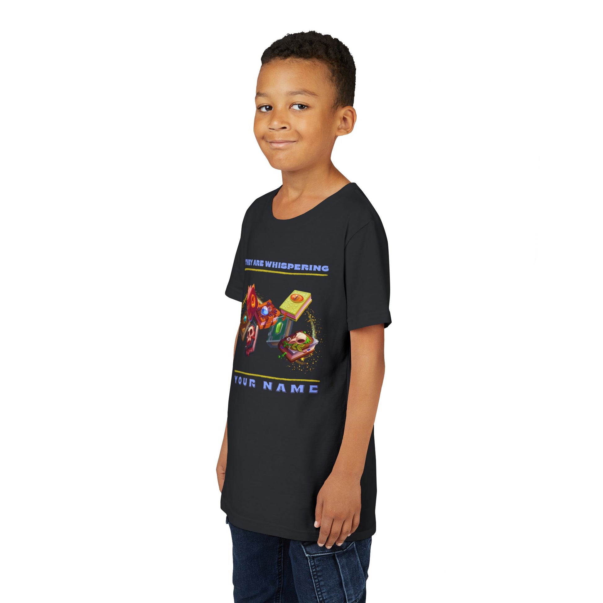 Boy wearing a black t-shirt with colorful swirling enchanted book and text 'They Are Whispering Your Name'