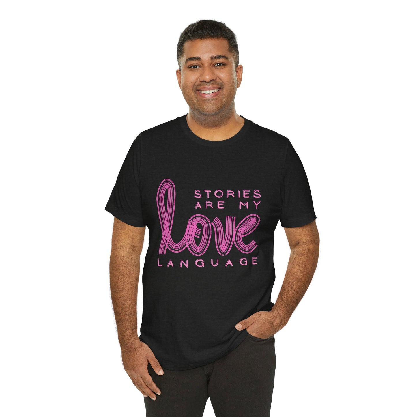 Man weraing a black t-shirt with pink text 'Stories Are My Love Language'