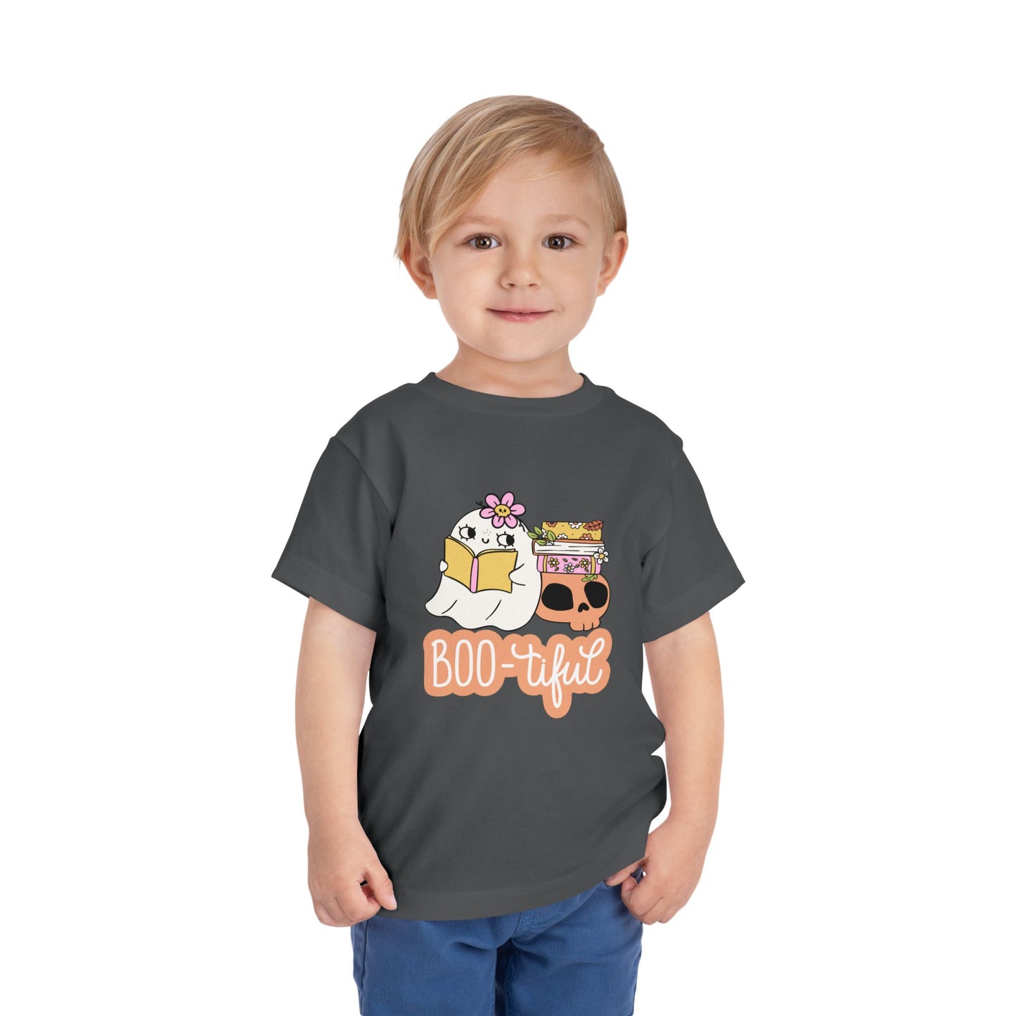 Child wearing a gray toddler t-shirt with a ghost reading a book and the word 'BOO-tiful' on a white background
