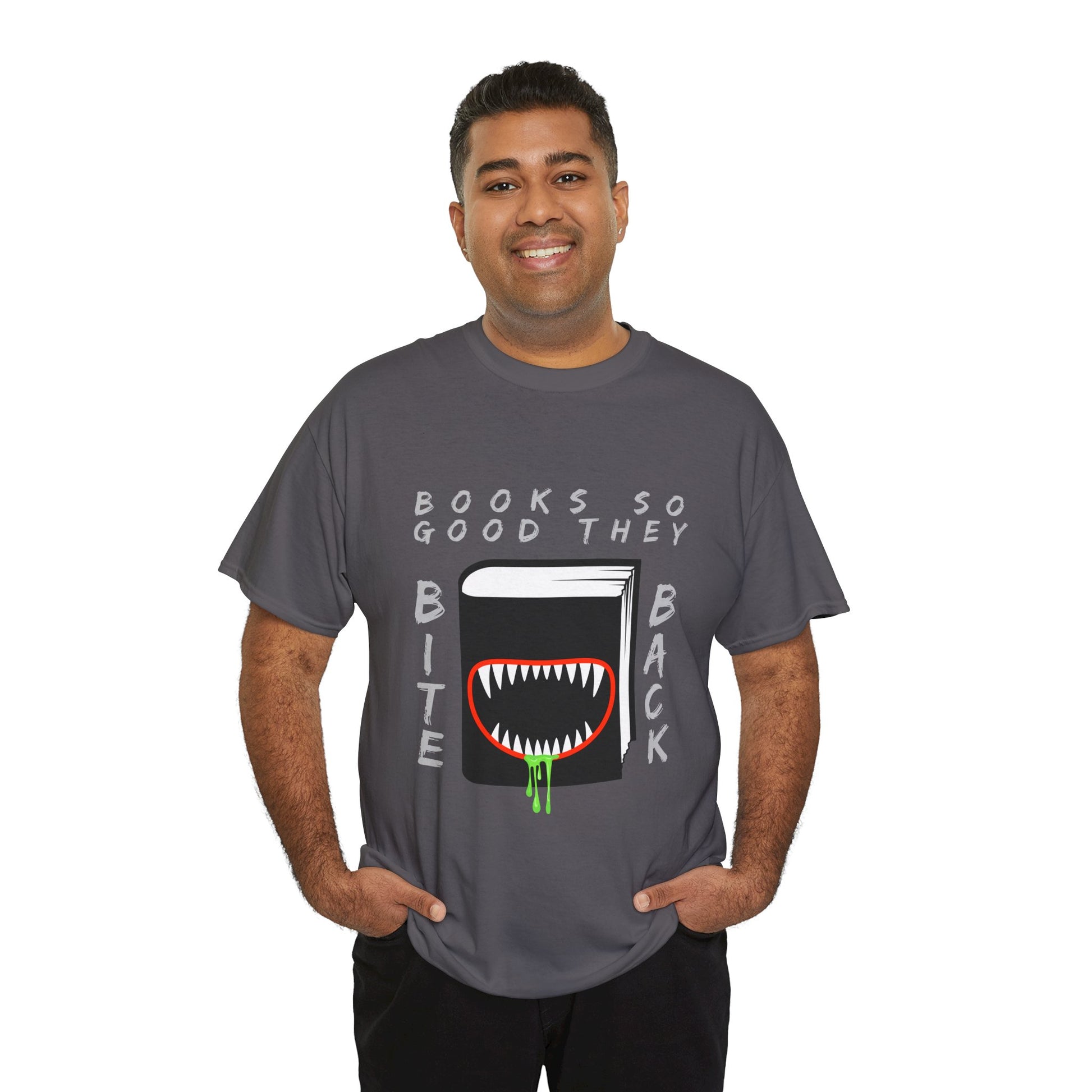 Man wearing a gray t-shirt with a graphic design of a book with a drooling monster mouth and text 'Books So Good They Bite Back' on a hanger against a white background
