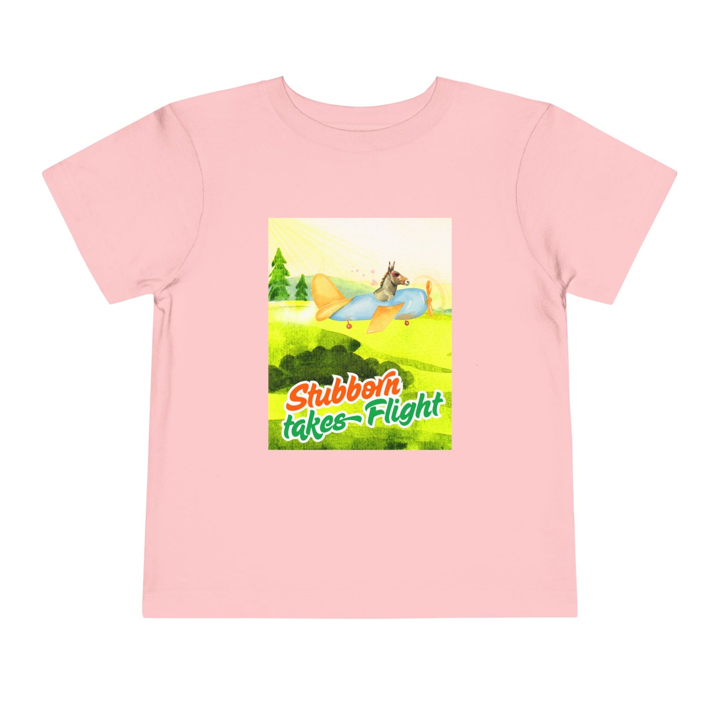Pink toddler t-shirt with a colorful graphic of a a donkey flying an airplane, with text 'Stubborn takes Flight' 
