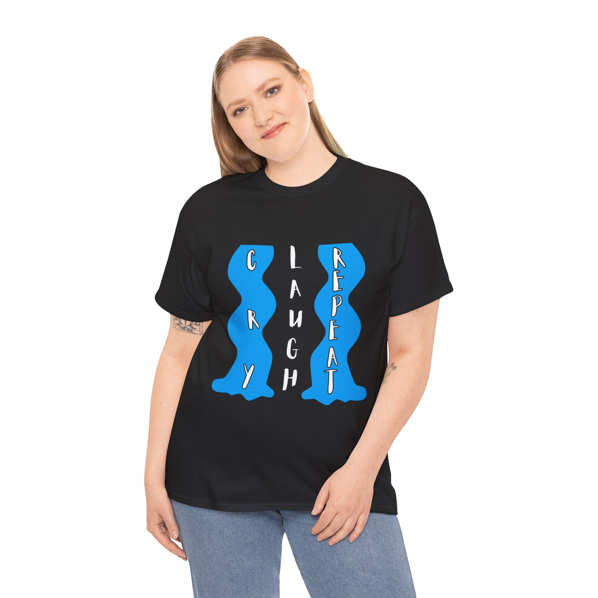 Woman wearing a dark t-shirt with blue waterfalls of tears and vertical text 'Cry. Laugh. Repeat' 