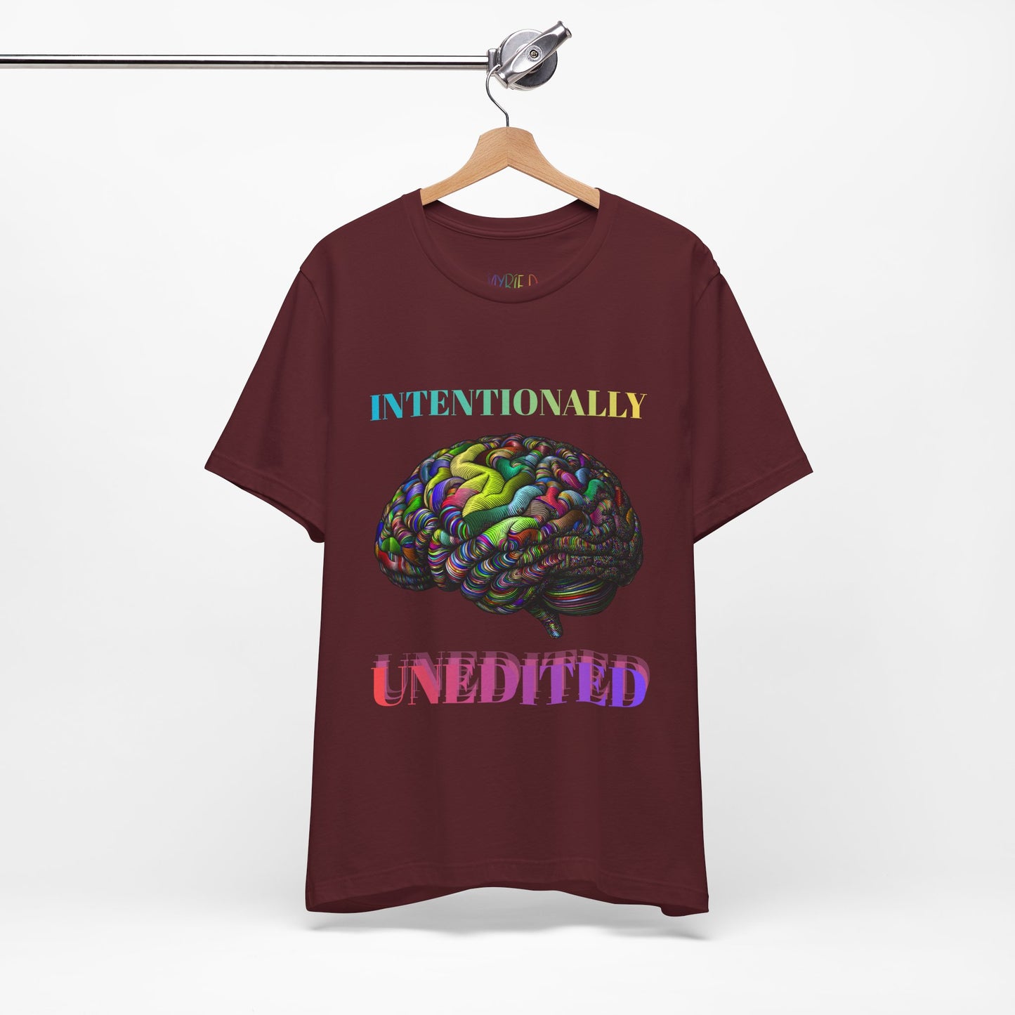 Maroon t-shirt with rainbow brain graphic and colorful text 'Intentionally Unedited'