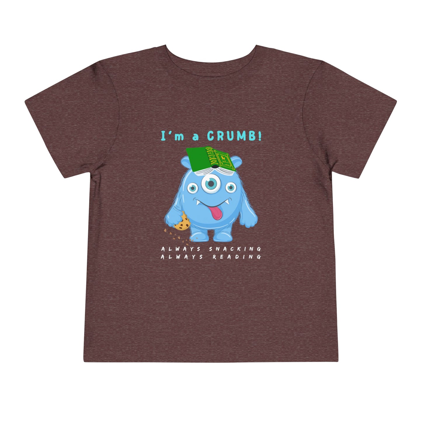 Maroon toddler personality t-shirt with a blue cartoon monster eating a cookie and wearing a book on it's head, proudly proclaiming 'I'm A Crumb!' Sub-text 'Always Snacking, Always Reading' on a white background