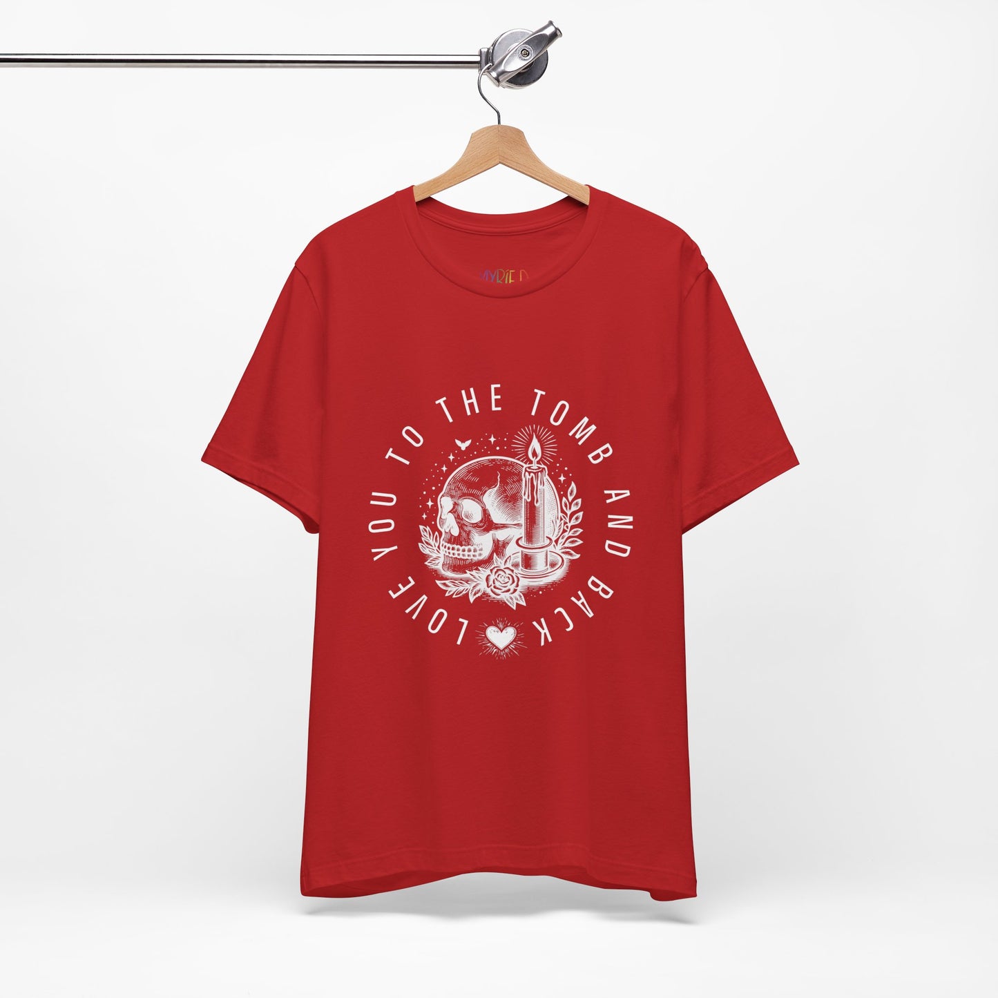 Red gothic t-shirt with a skull and candle graphic design circled by text 'Love You To The Tomb And Back'