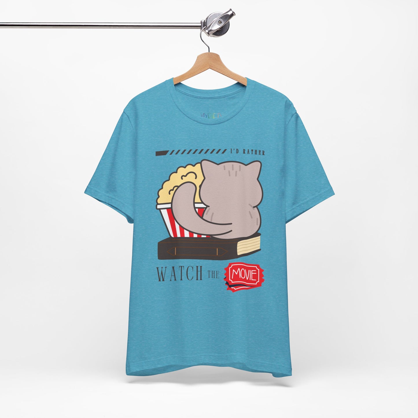 Turquoise t-shirt with the back of a cat, sitting on a book, with a bucket of popcorn, and text 'I'd Rather Watch The Movie' 