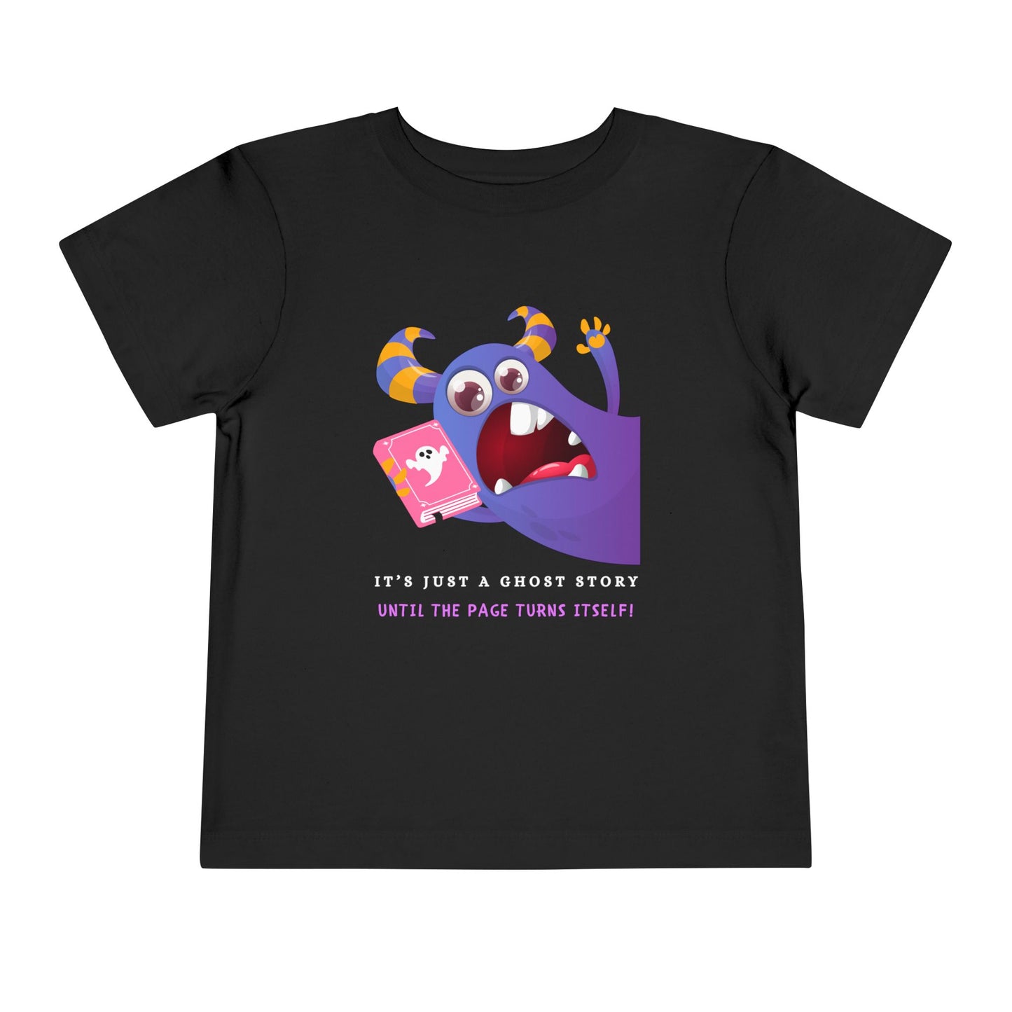 Black toddler t-shirt with a scared purple monster holding a pink ghost book and text 'It's just a ghost story until the page turns itself!'