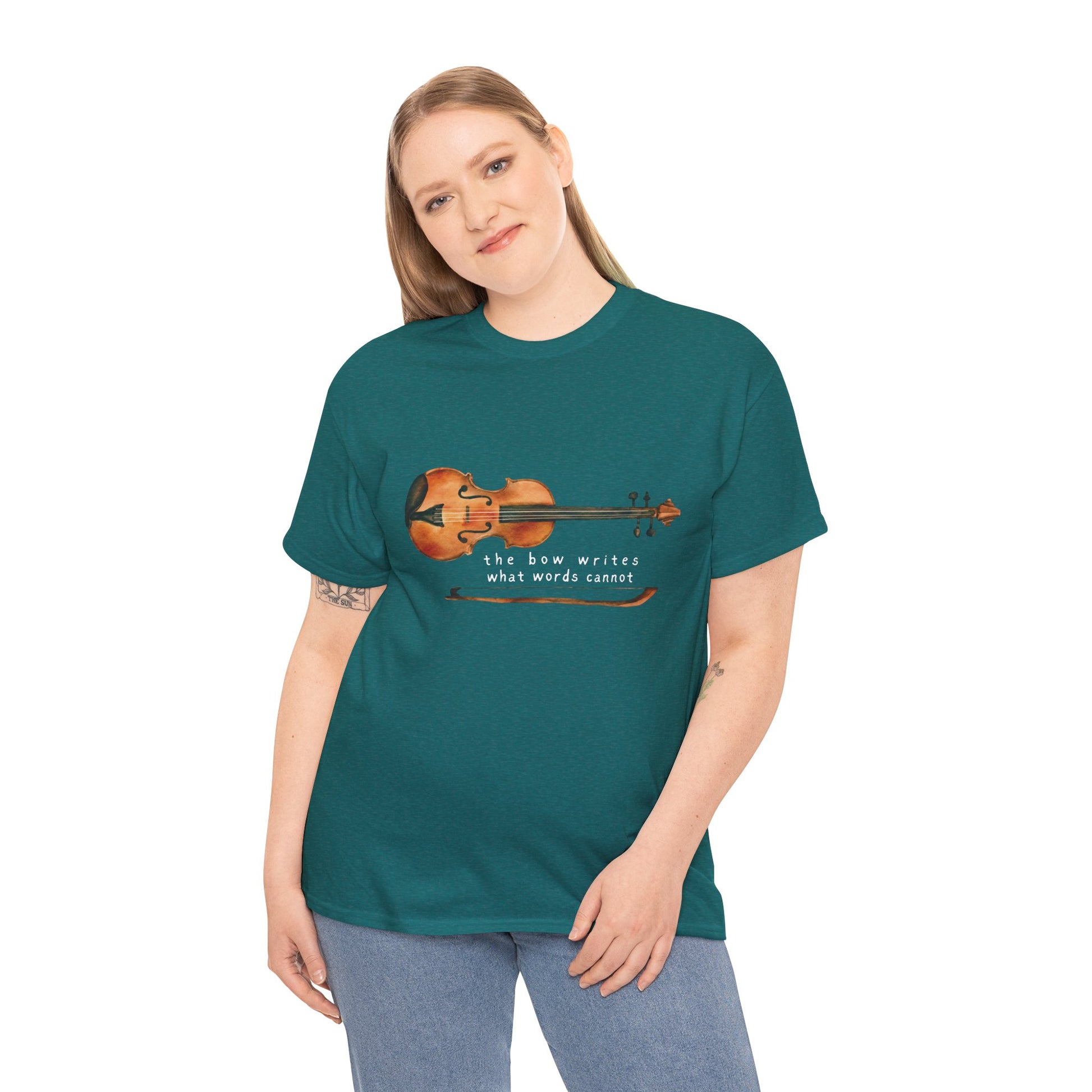Woman wearing a teal t-shirt with a violin graphic and text 'the bow writes what words cannot'