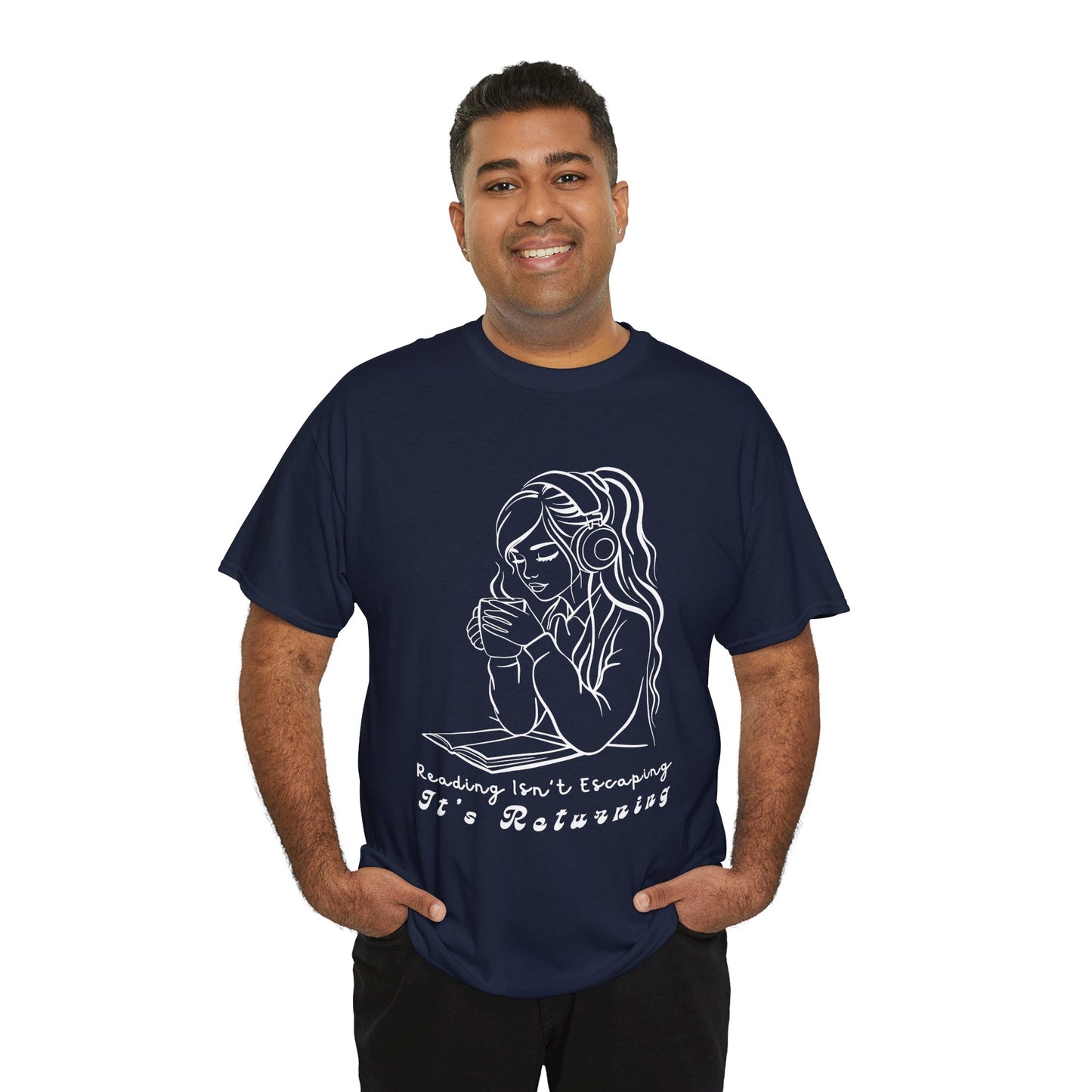 Man wearing a navy blue t-shirt with a woman wearing headphones, cupping a hot beverage and reading a book, text 'Reading Isn't Escaping, It's Returning'