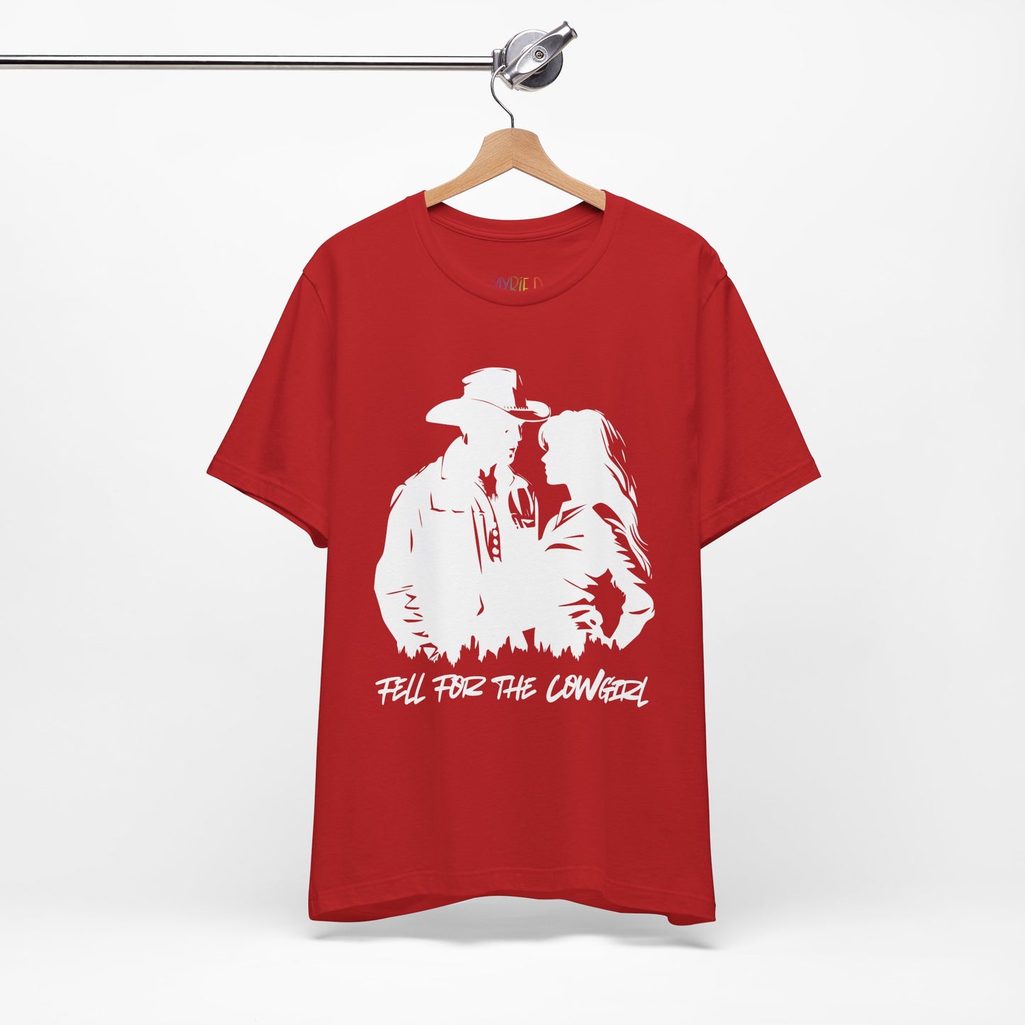 Red t-shirt with white graphic of a man and a woman, text says 'Fell for the Cowgirl'