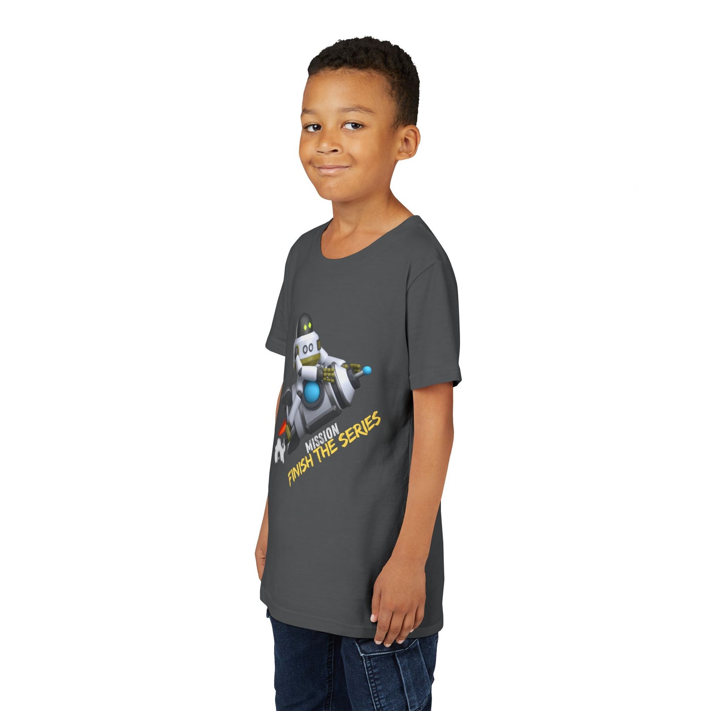 Boy wearing a gray t-shirt with a robot riding a rocket and text 'Mission Finish The Series'