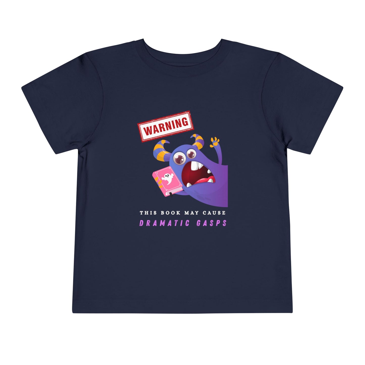 Navy blue toddler t-shirt with an open mouth purple monster holding a pink book and a WARNING ' This Book May Cause Dramatic Gasps'