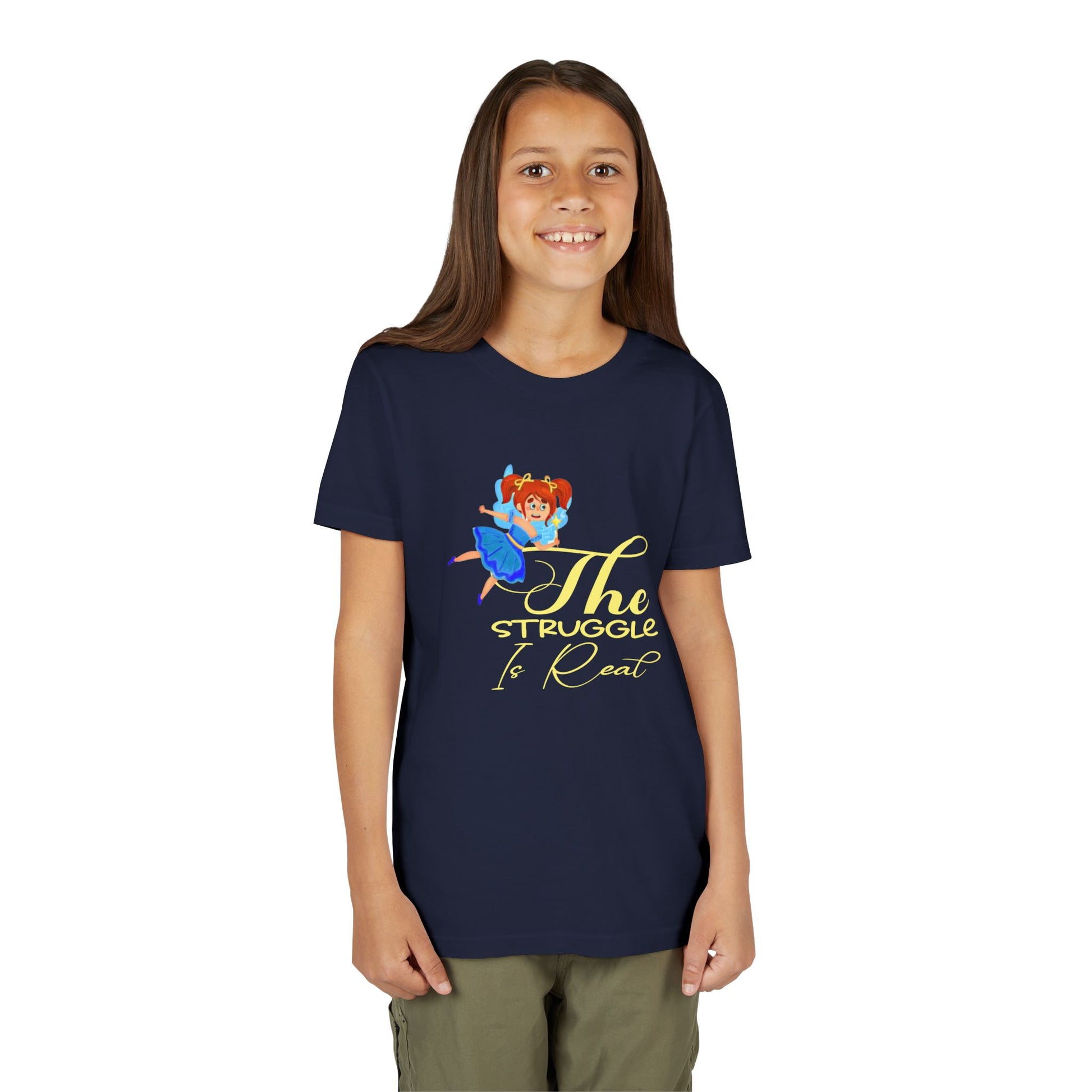 Girl wearing a navy blue t-shirt with cartoon fairy and 'The Struggle Is Real' text 