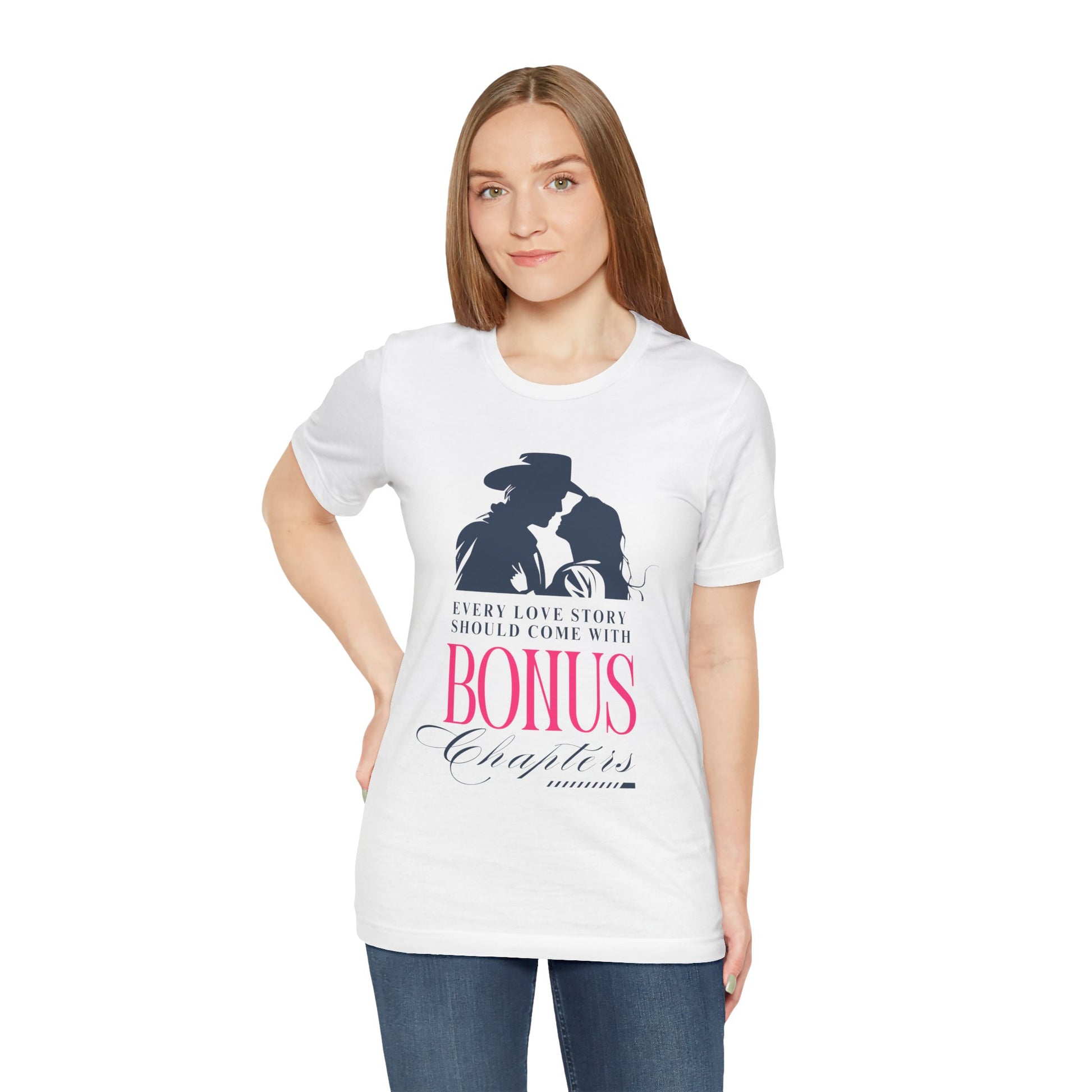 Woman wearing a white t-shirt with western graphic of a man and woman leaning in for a kiss, text "Every Love Story Should Come With BONUS Chapters'