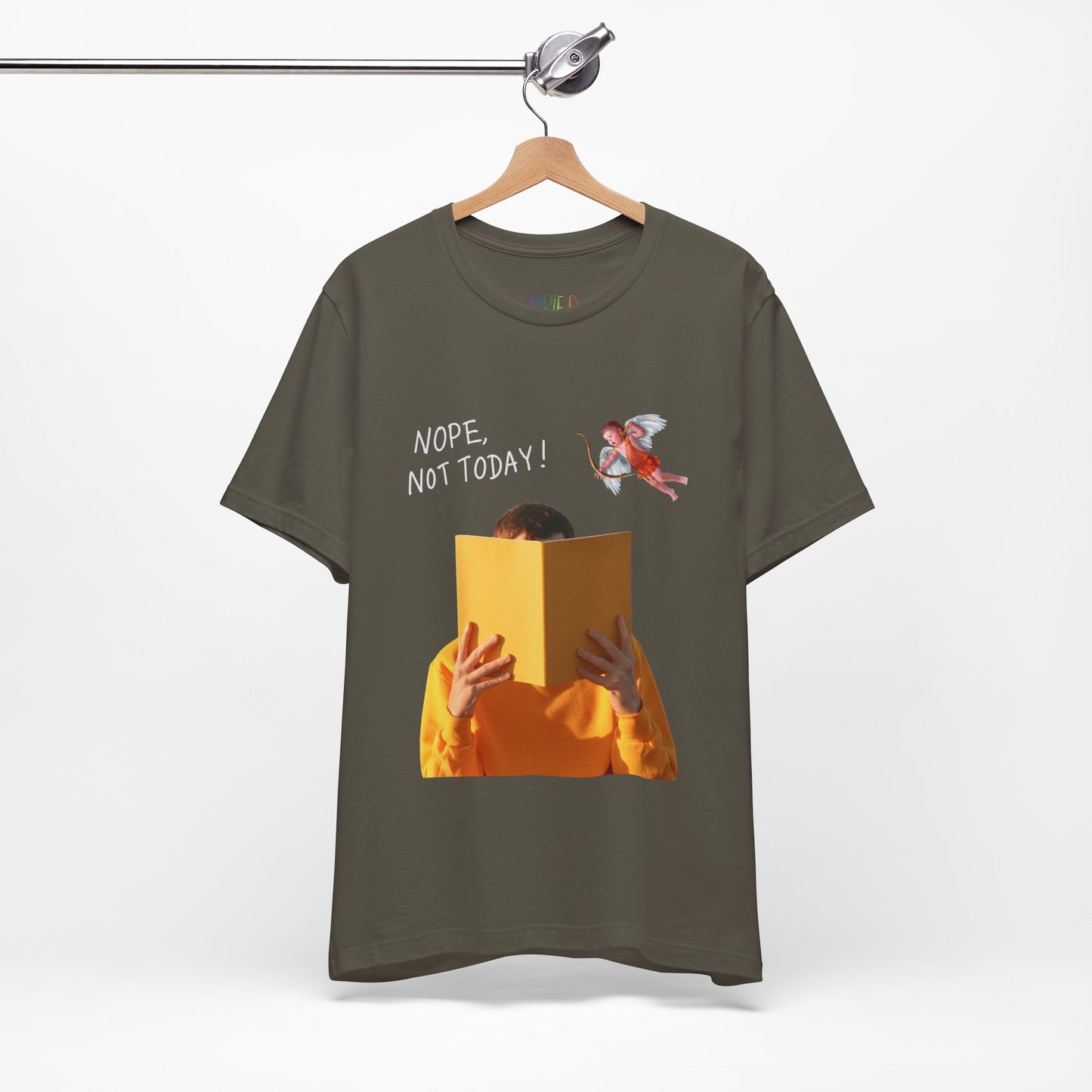 Army green t-shirt with graphic design of person holding a book in front of their face while cupid is hovering above and text 'NOPE, NOT TODAY!' 