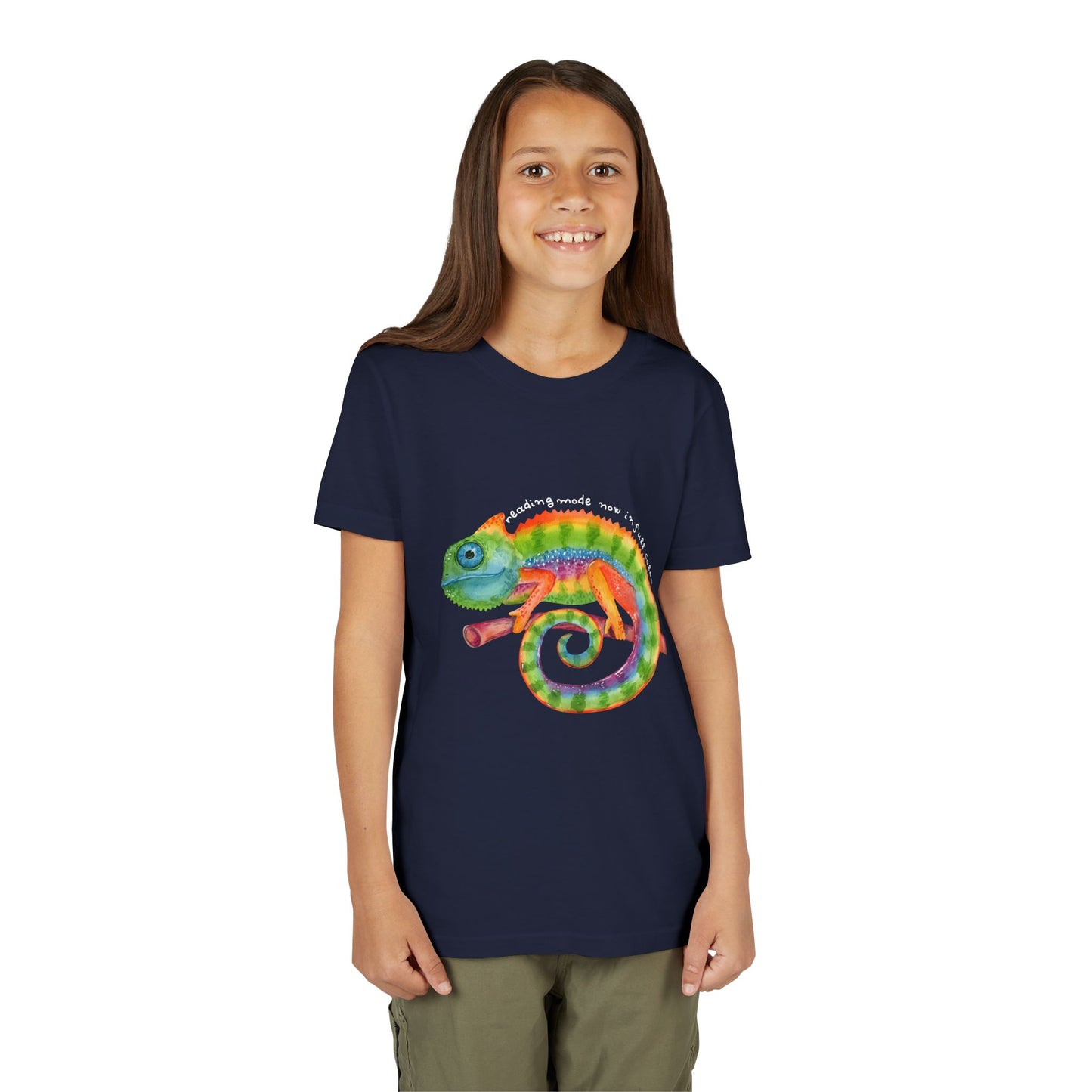 Girl wearing a navy blue t-shirt with a colorful chameleon and text 'reading mode now in full color'