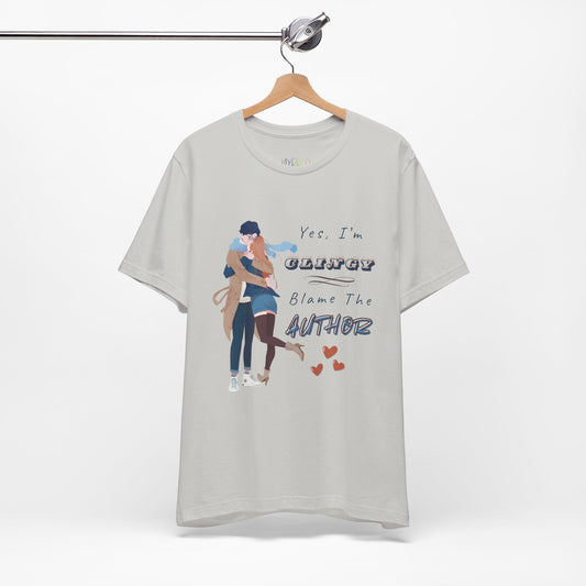 Gray t-shirt with graphic design of a woman snuggled up to a man and text " and text on a white background 'Yes, I'm CLINGY. Blame The Author.'