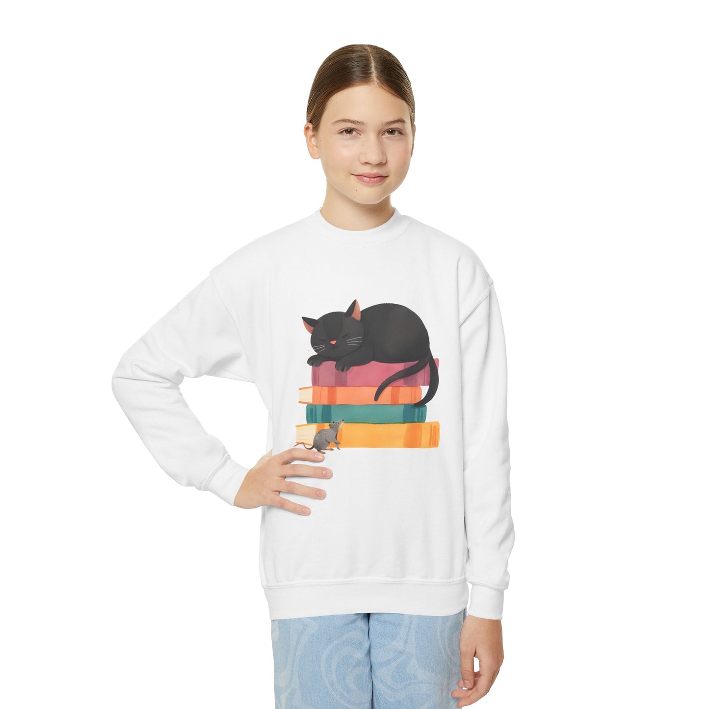 Girl wearing a white sweatshirt with a black cat and sleeping on a stack of books