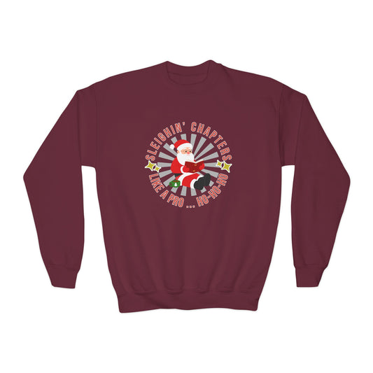 Maroon sweatshirt with Santa Claus graphic reading a book, encircled by text "Sleighin' Chapters Like a Pro... Ho-Ho-Ho'