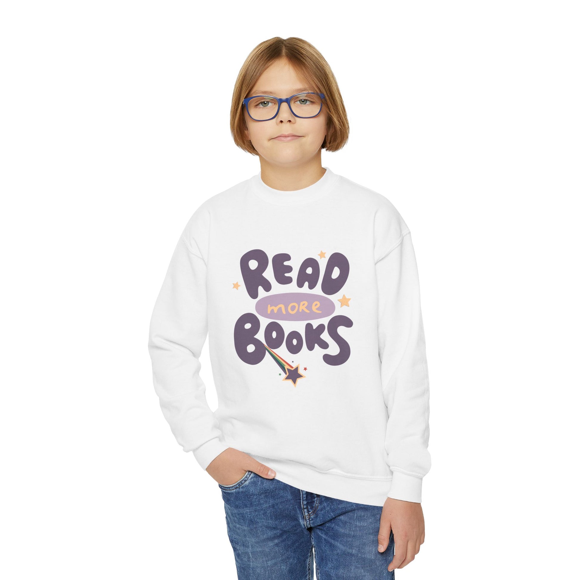 Boy wearing a white sweatshirt with 'Read More Books' text and a shooting star