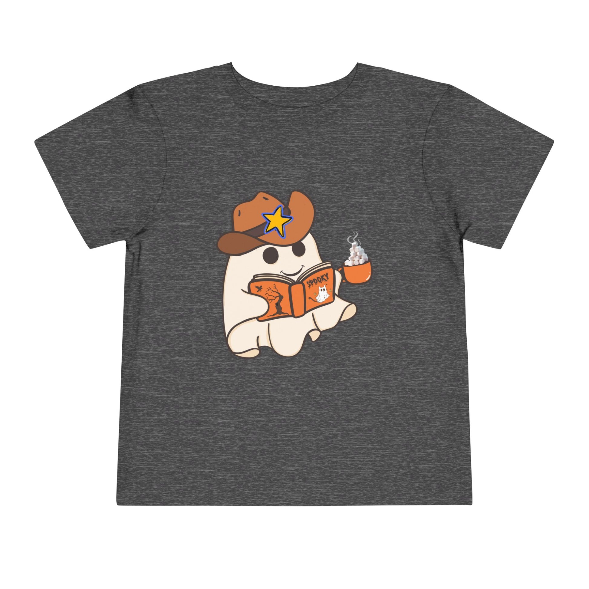 Gray toddler t-shirt with a cartoon ghost, wearing a cowboy hat, reading a spooky book and holding a cup of hot cocoa