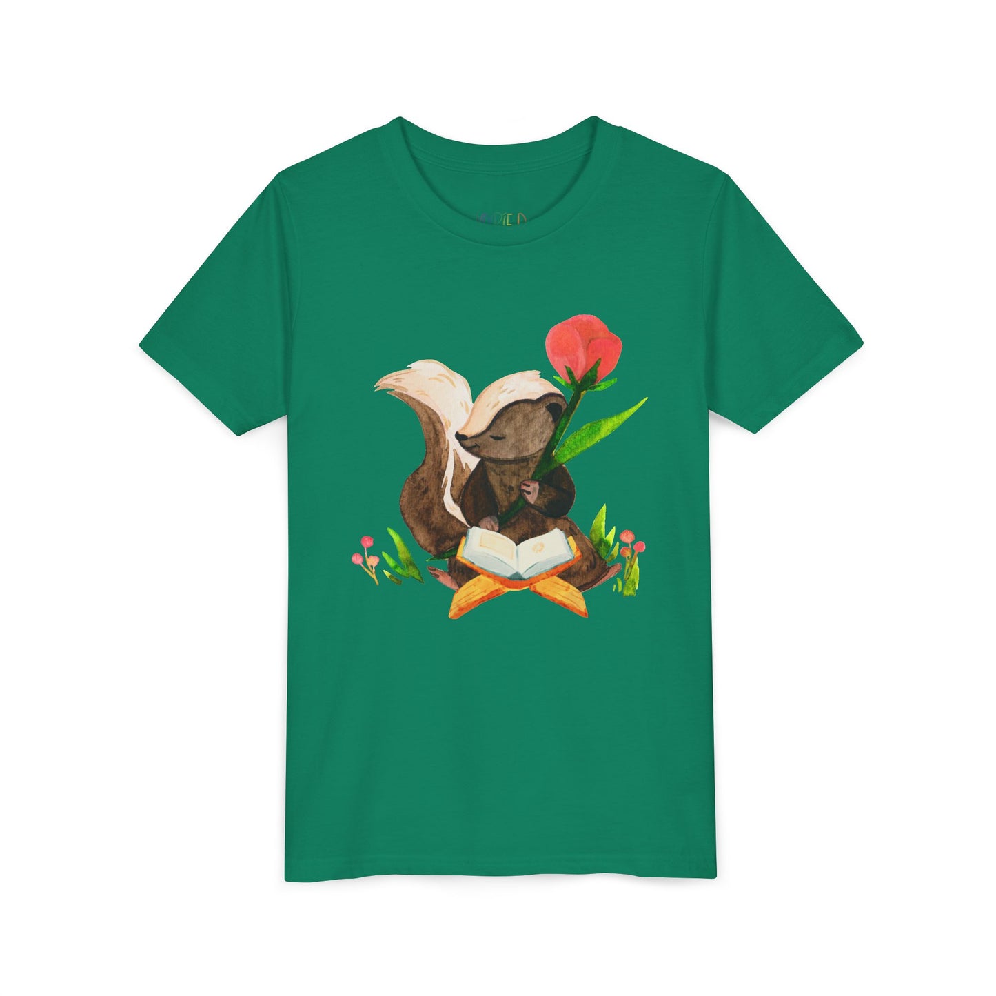Green t-shirt with a graphic of a skunk reading a book in a patch of flowers