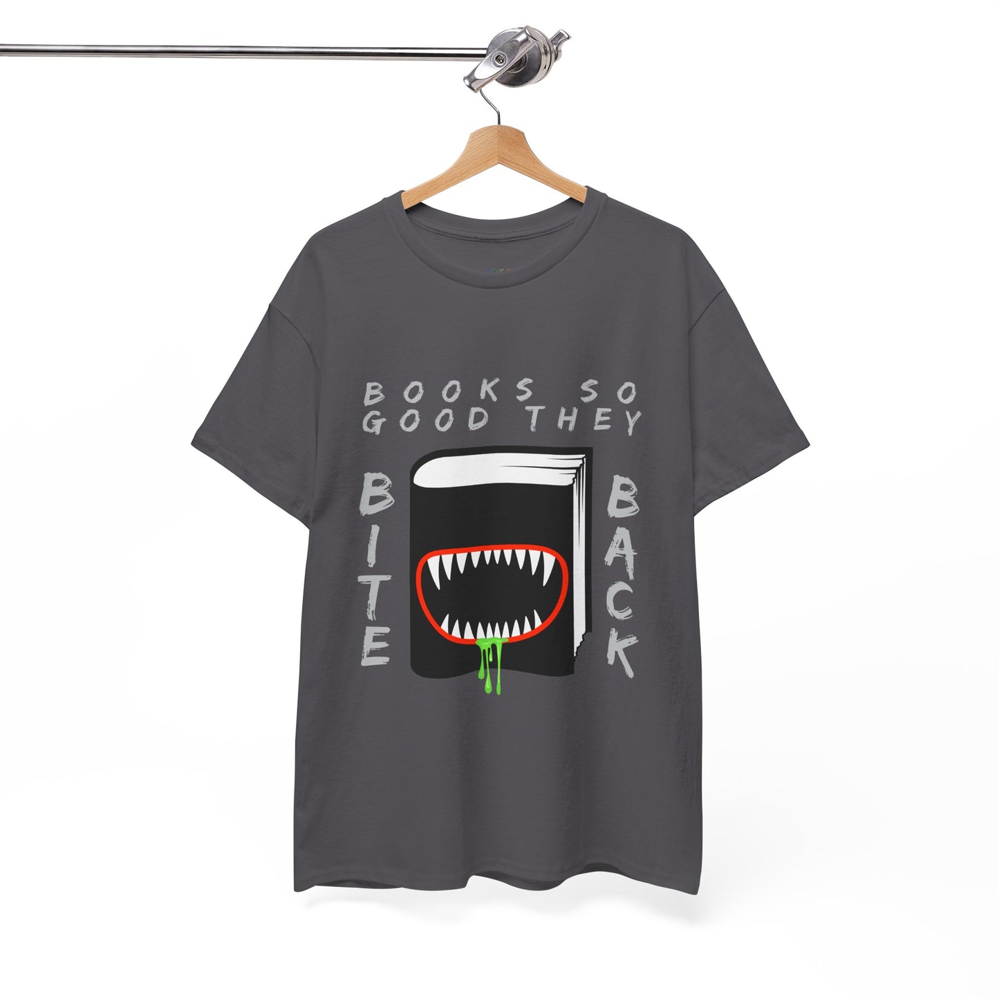 Gray t-shirt with a graphic design of a book with a drooling monster mouth and text 'Books So Good They Bite Back' on a hanger against a white background