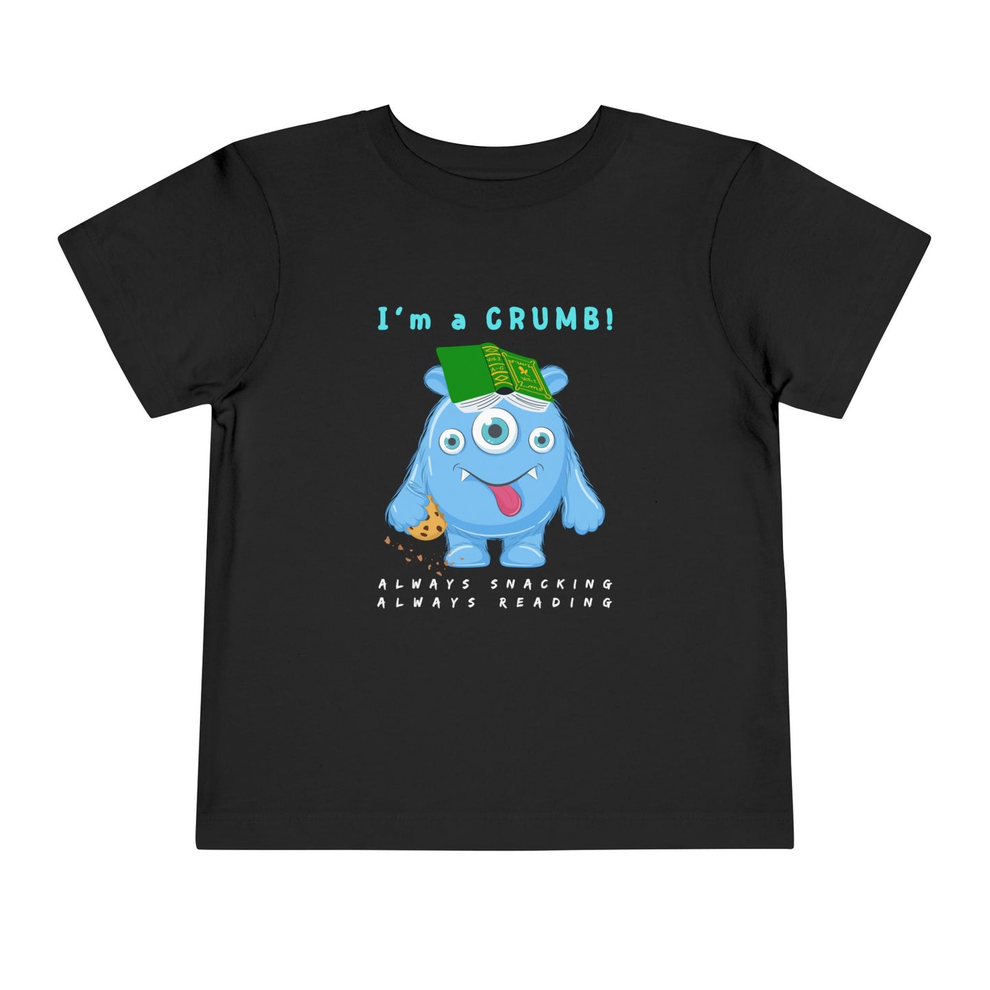 Black toddler personality t-shirt with a blue cartoon monster eating a cookie and wearing a book on it's head, proudly proclaiming 'I'm A Crumb!' Sub-text 'Always Snacking, Always Reading' on a white background