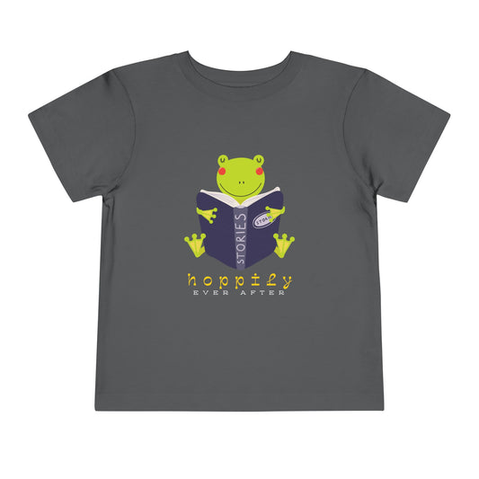 Gray toddler t-shirt with a frog reading a book graphic and text 'Hoppily Ever After'
