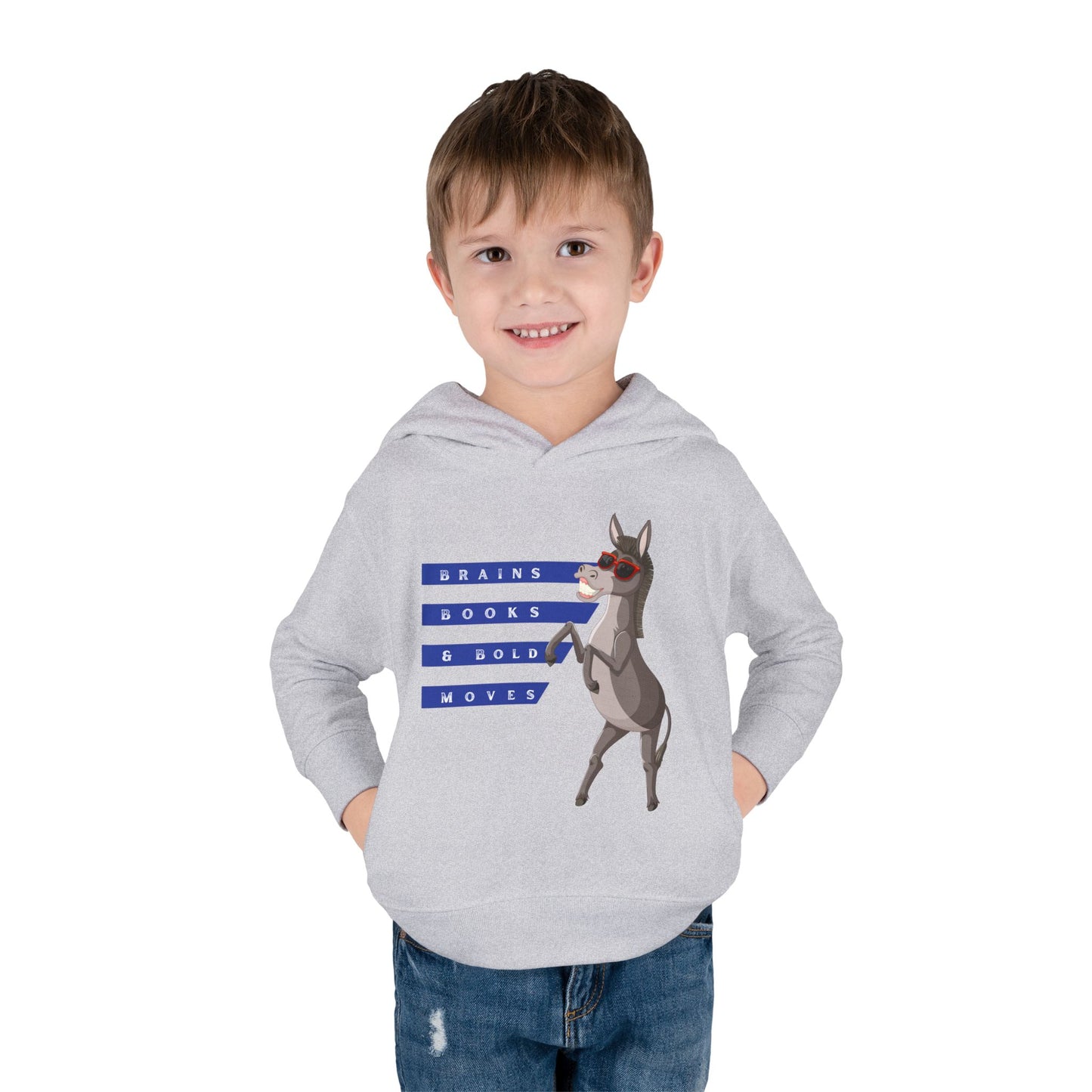 Boy wearing a light gray toddler sweatshirt featuring Donkey Dell in cool red sunglasses and text 'Brains, Books, & Bold Moves' on a white background