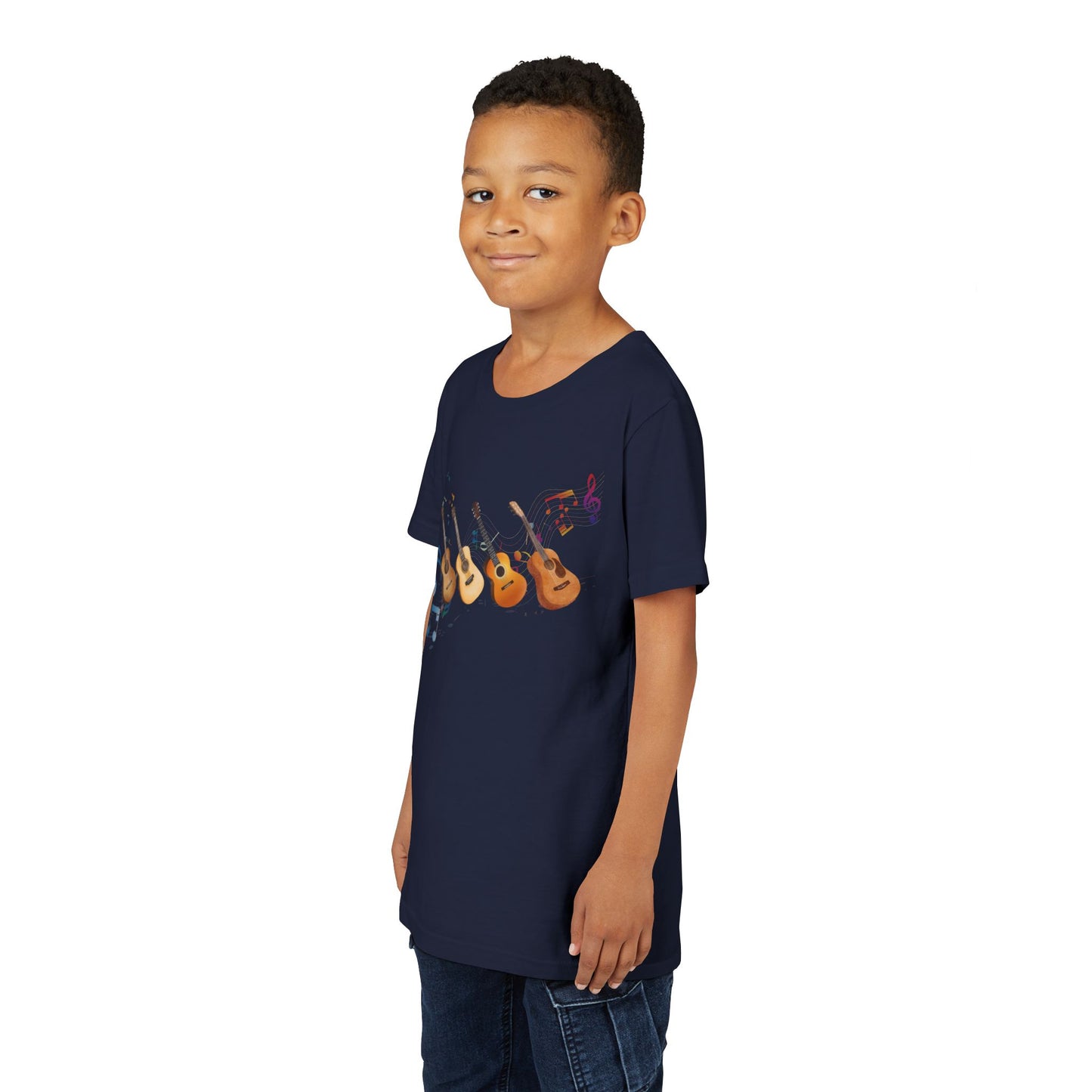 Boy wearing a navy blue t-shirt with colorful music notes and a row of guitars 