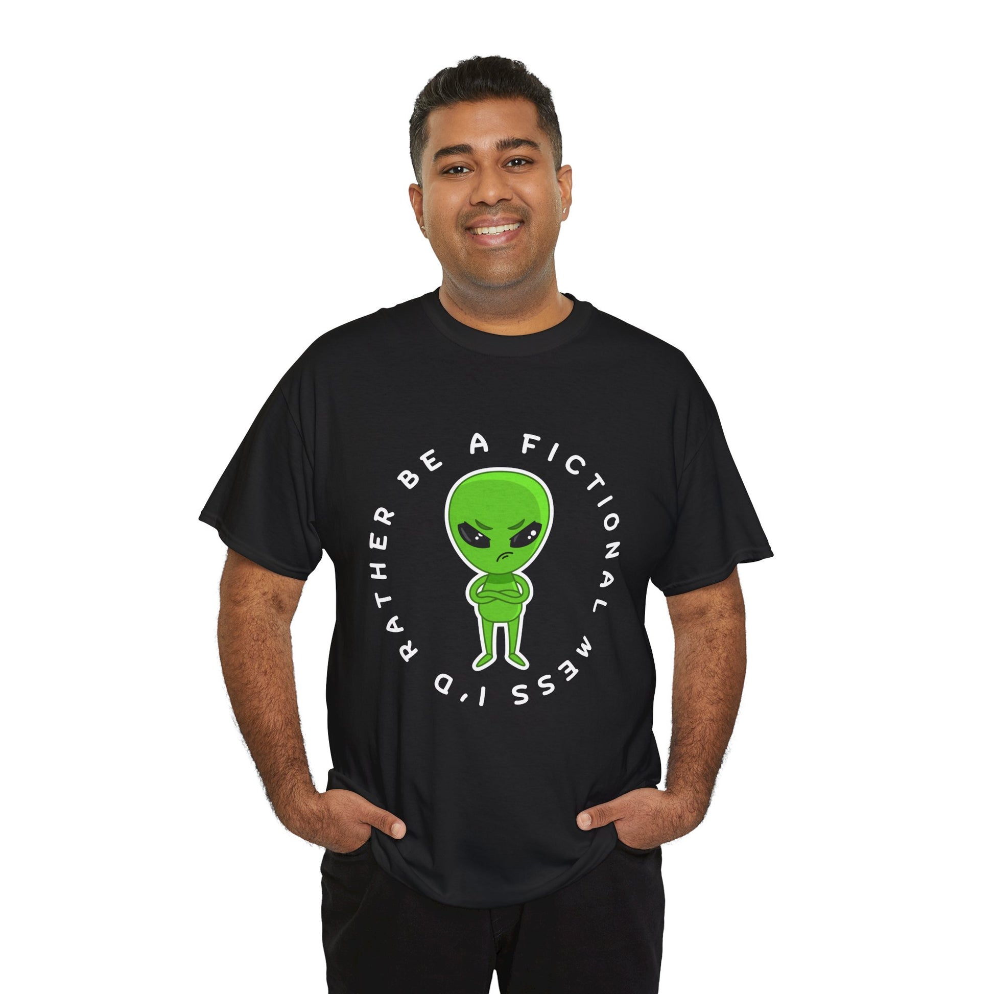 Man wearing a black t-shirt with a grumpy faced, cross armed green alien, and text 'I'd Rather Be A Fictional Mess'
