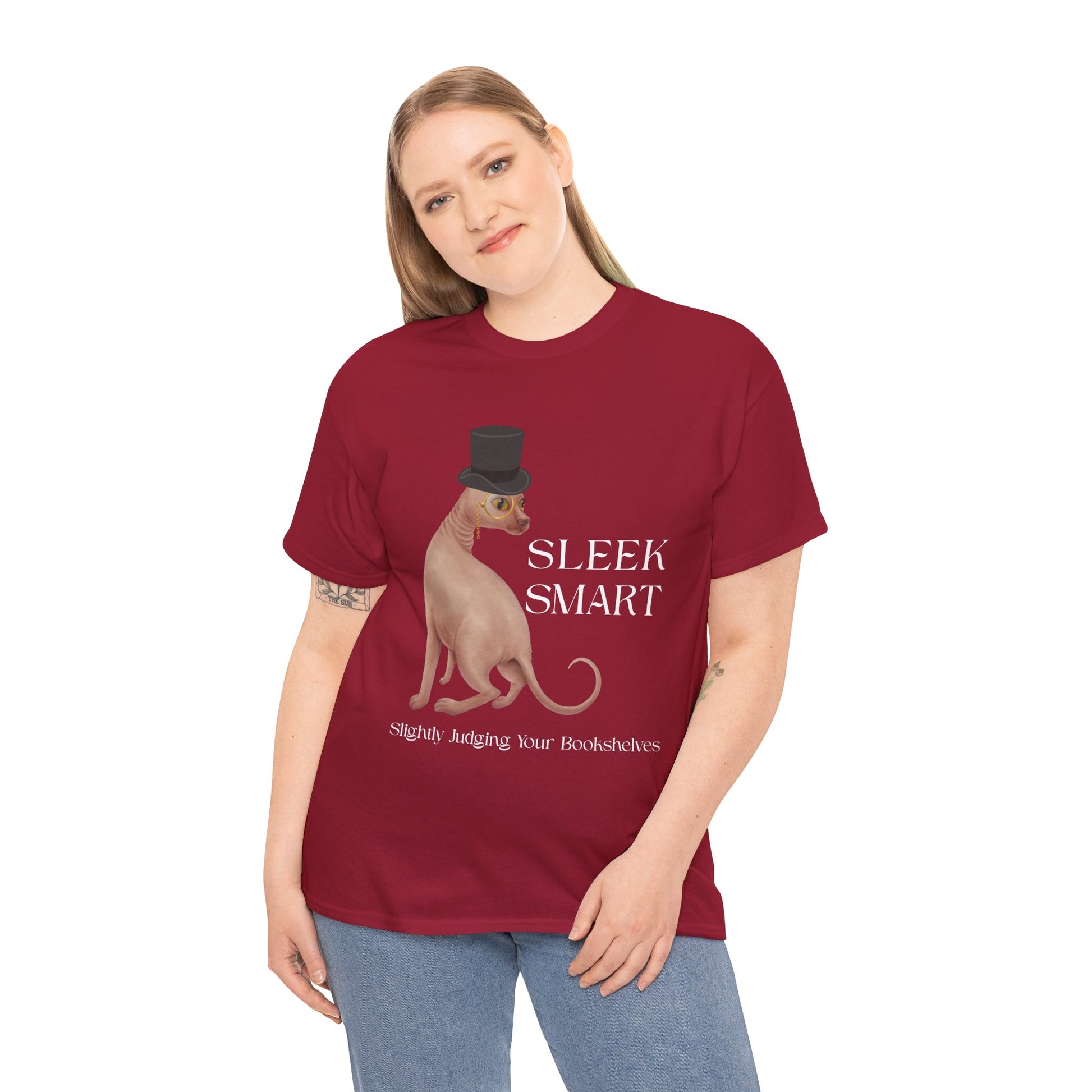 Woman wearing a red t-shirt with a hairless cat in a monacle and top hat, text "SLEEK SMART' and 'Slightly Judging Your Bookshelf'