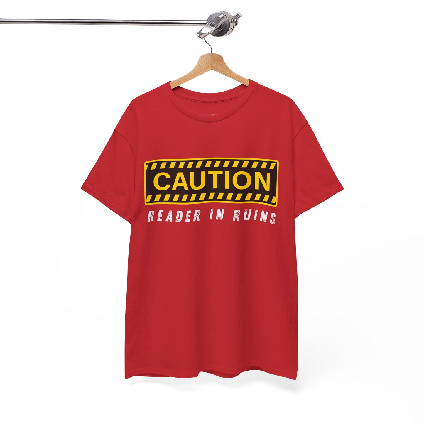 Red t-shirt with yellow and black 'Caution' graphic and text beneath ' Reader In Ruins'