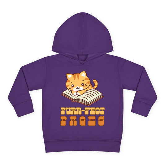 Orange cartoon kitten sitting on an open book with the words “Purr-fect Pages” in playful lettering — printed on a soft toddler hoodie.