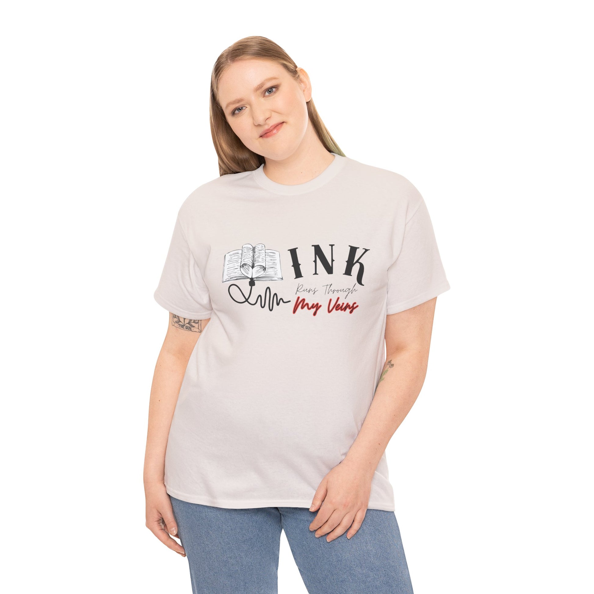 Woman wearing an ice gray t-shirt with an IV connected to an open book and text 'INK Runs Through My Veins' 