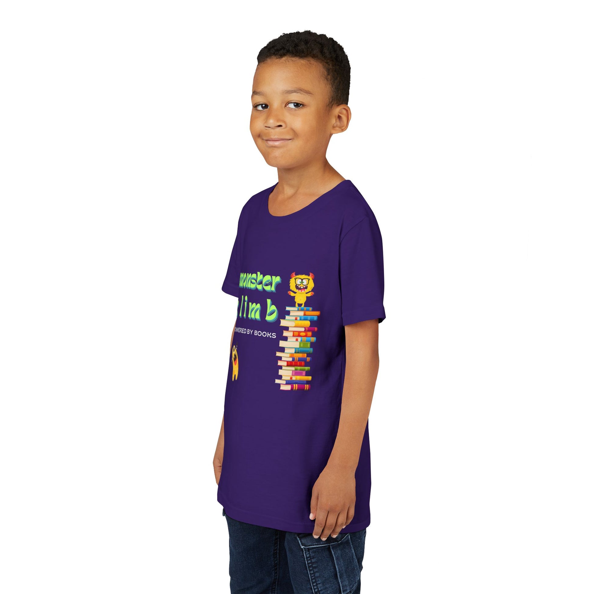 Boy wearing a purple t-shirt with one very excited monster looking up at a fellow monster standing on top of a stack of books and text 'Monster Climb Powered By Books'