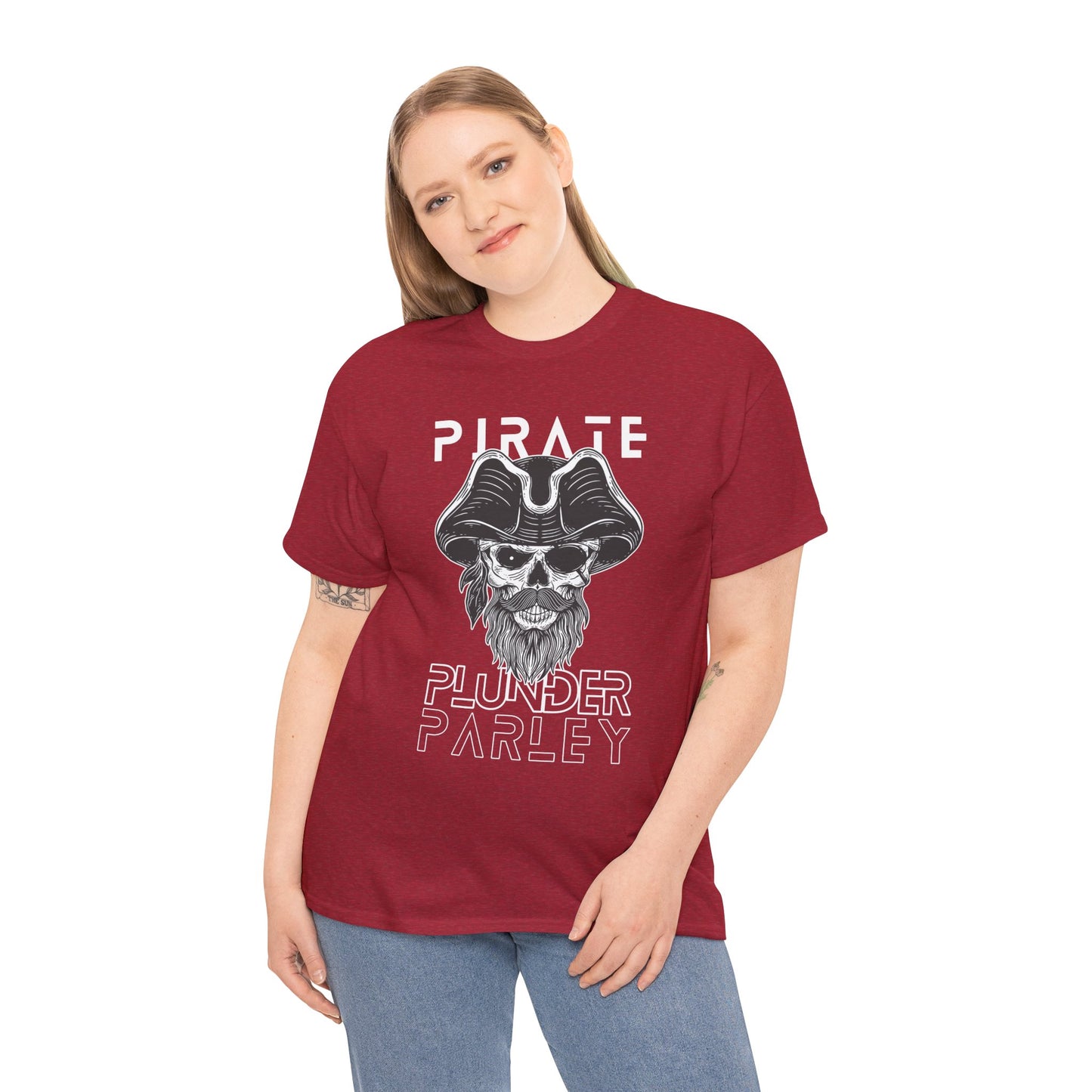 Woman wearing a red t-shirt with a black and white pirate graphic and text 'Pirate. Plunder. Parley'