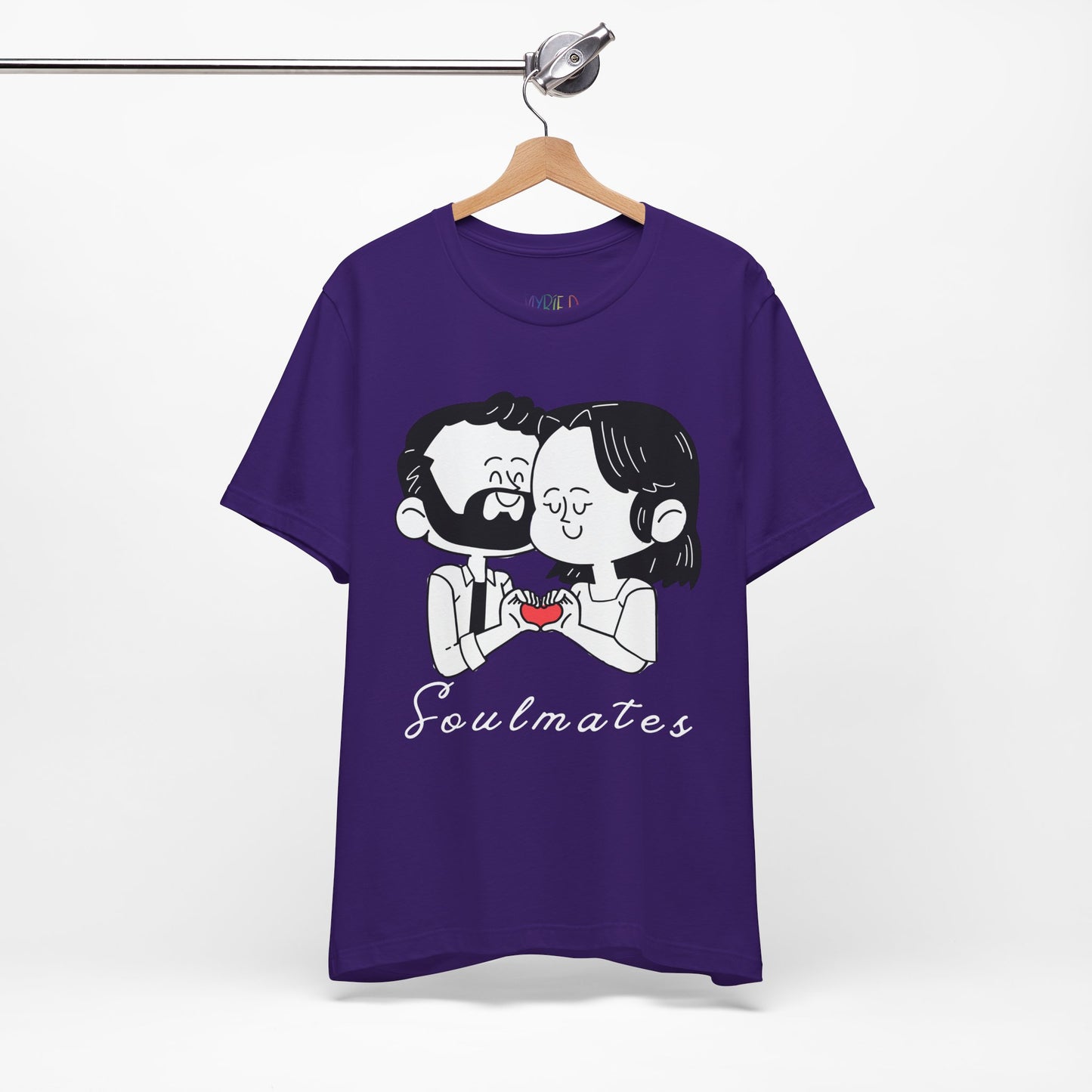 Purple t-shirt with a graphic of two people snuggled, making a heart shape by putting their hands together and text 'Soulmates' 
