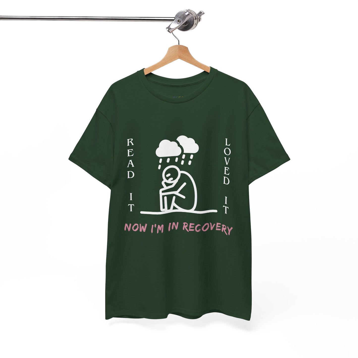 Dark green t-shirt with a white graphic of a sad stick figure sitting under a cloud and text 'Read It. Loved It. Now I'm In Recovery.' 