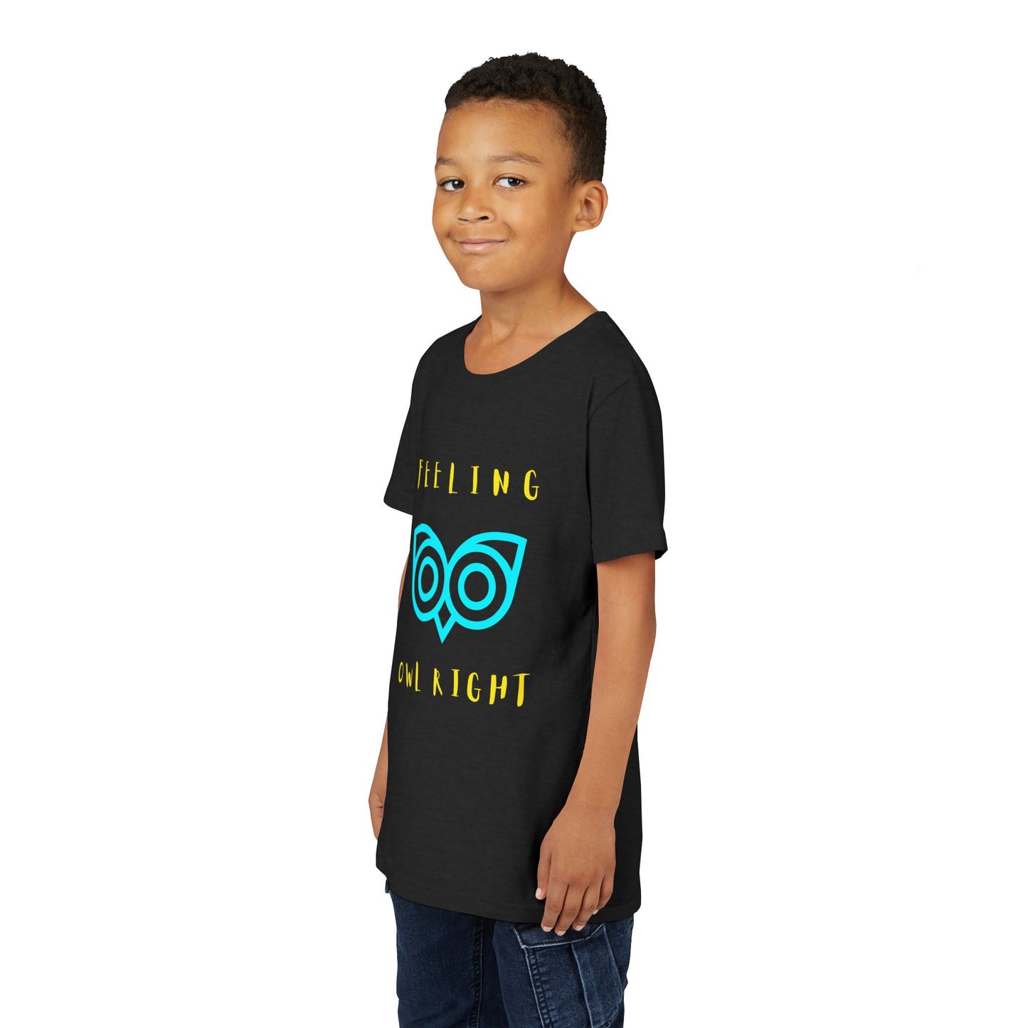 Boy wearing a black t-shirt with yellow text and blue owl graphic 'Feeling Owl Right'