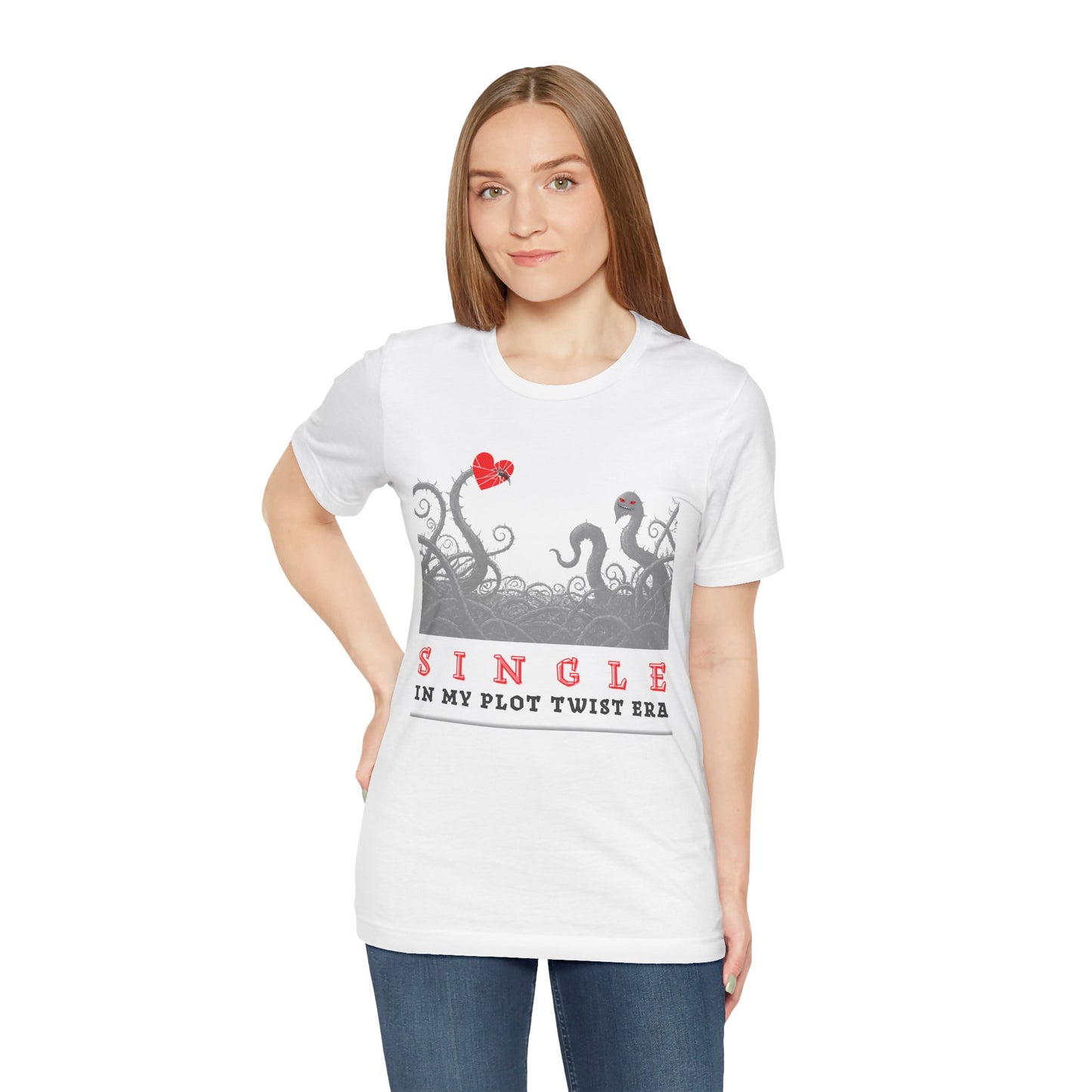 Woman wearing a white t-shirt with thorny vines stabbed through a heart and text 'SINGLE. In My Plot Era' 
